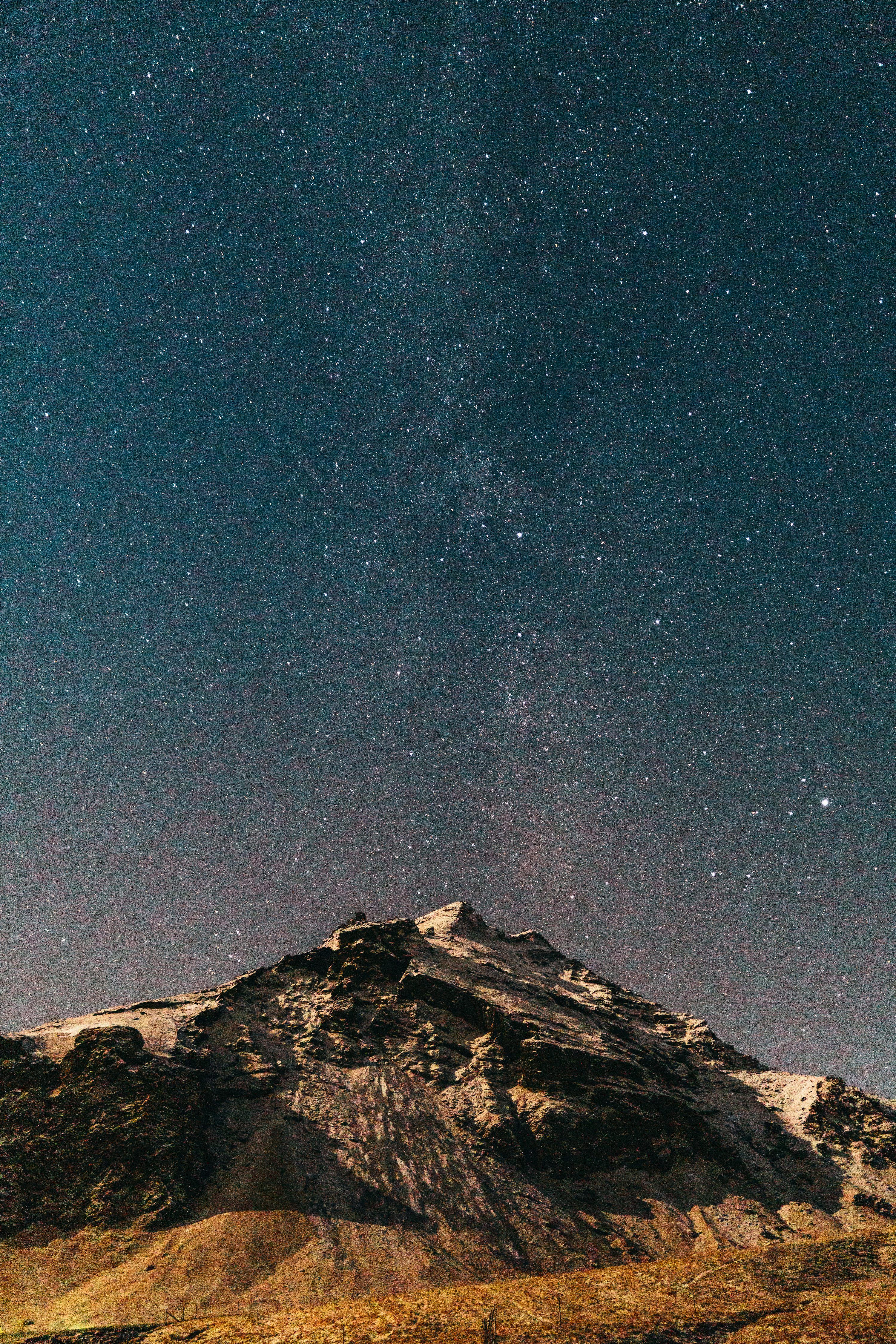3000x4500 Mountain under starry night photo