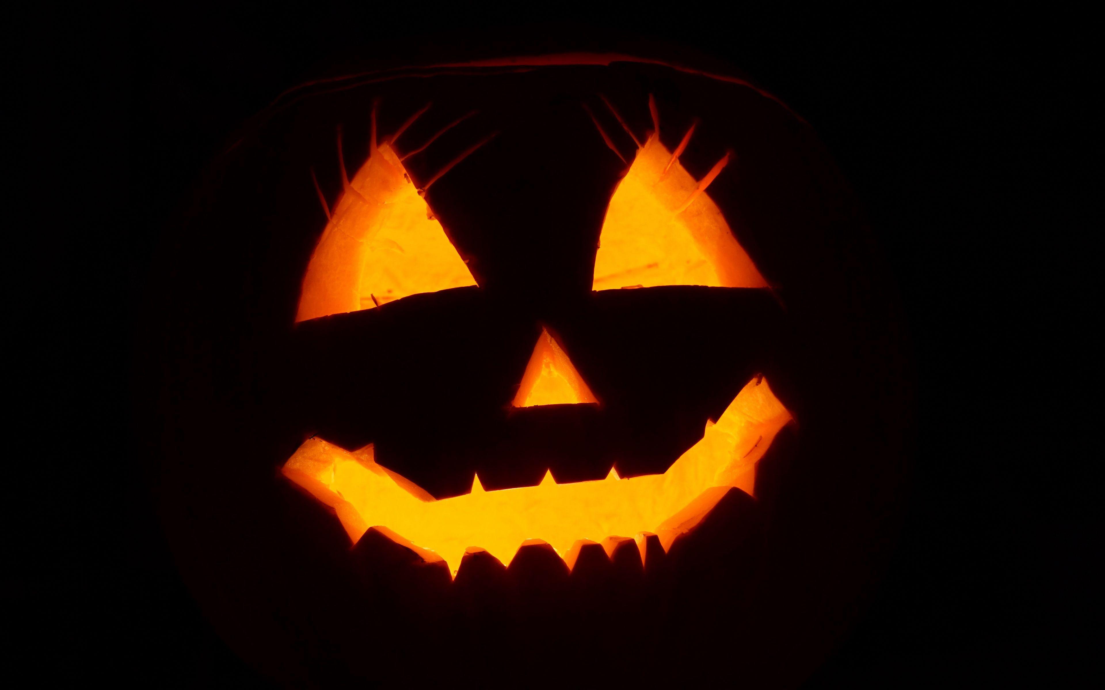 3840x2400 Download wallpaper 3840x2400 halloween, face, black background 4k