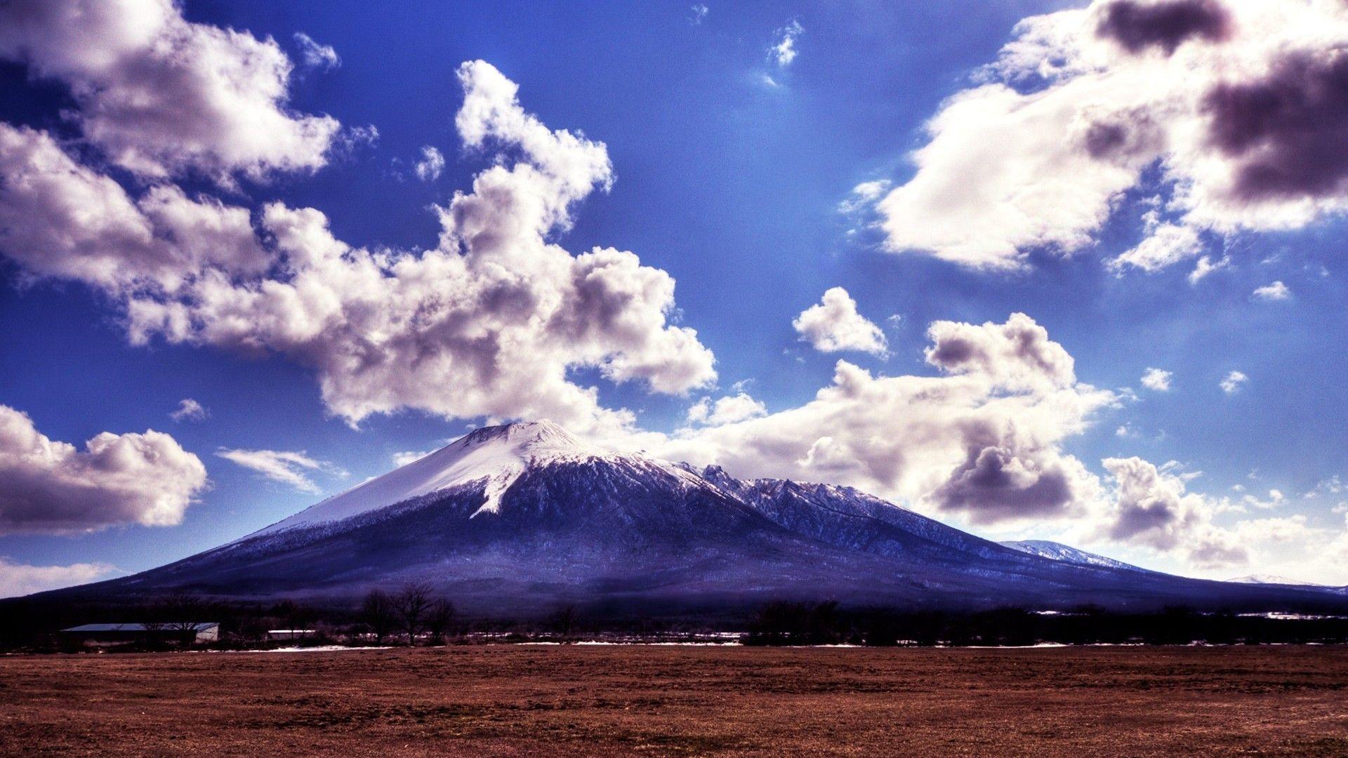 1920x1080 Cloudy Mountain Wallpaper