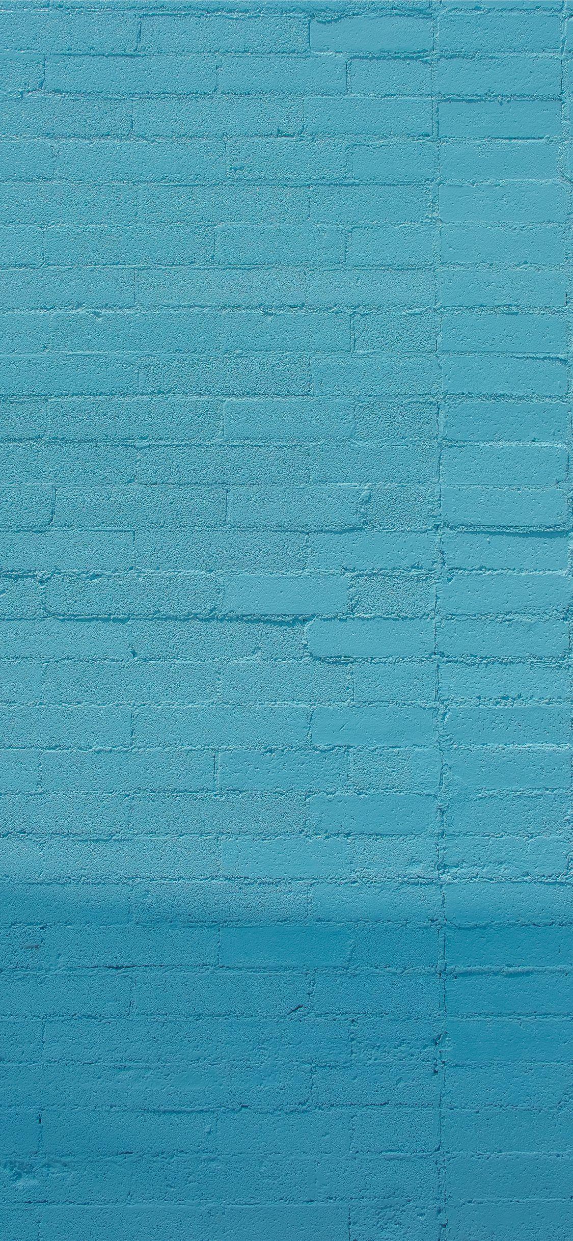 1125x2436 blue wall bricks iPhone 11 Wallpaper Free Download