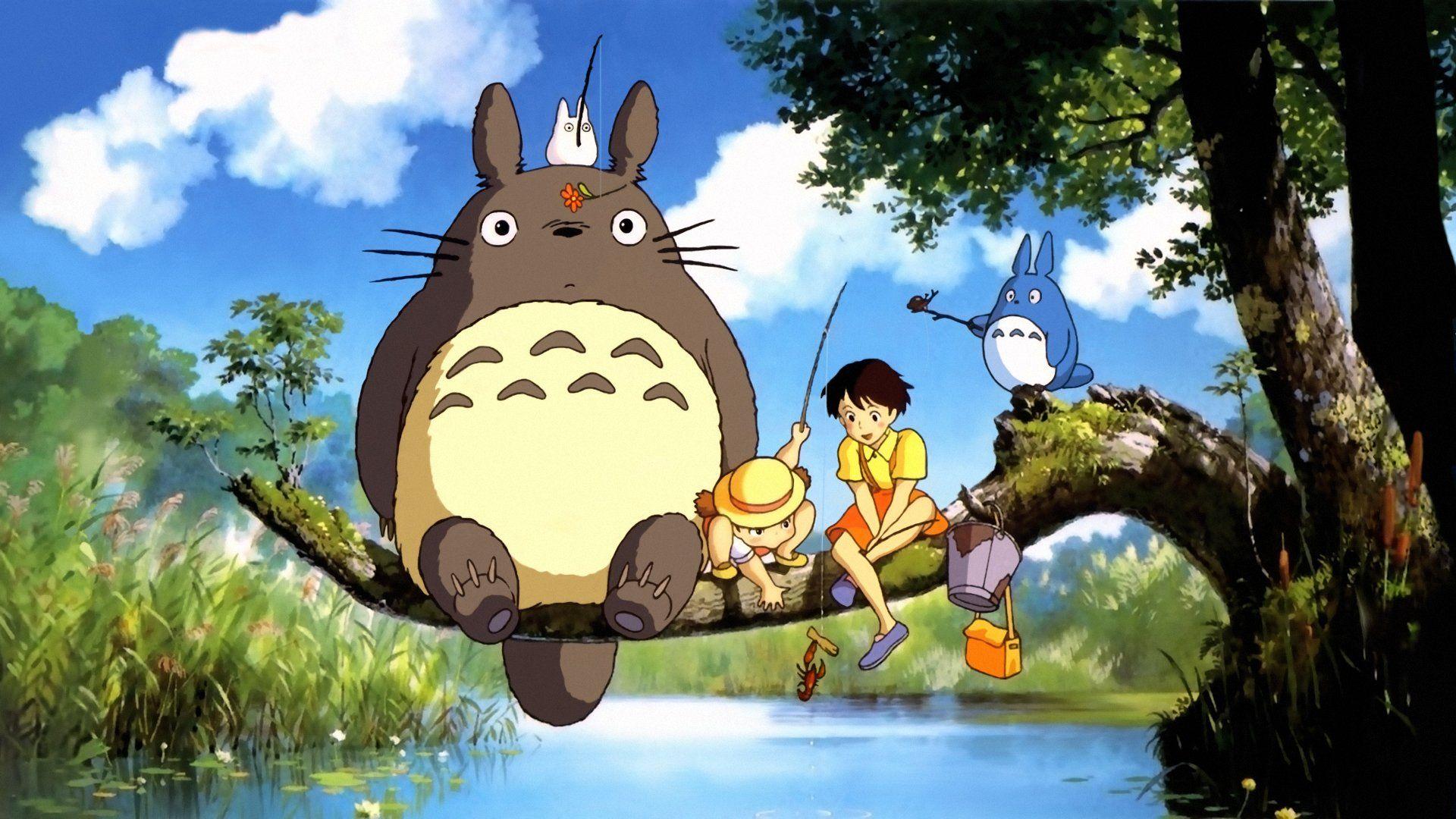 Download a totoro sitting on a tree with an umbrella Wallpaper  Wallpapers com