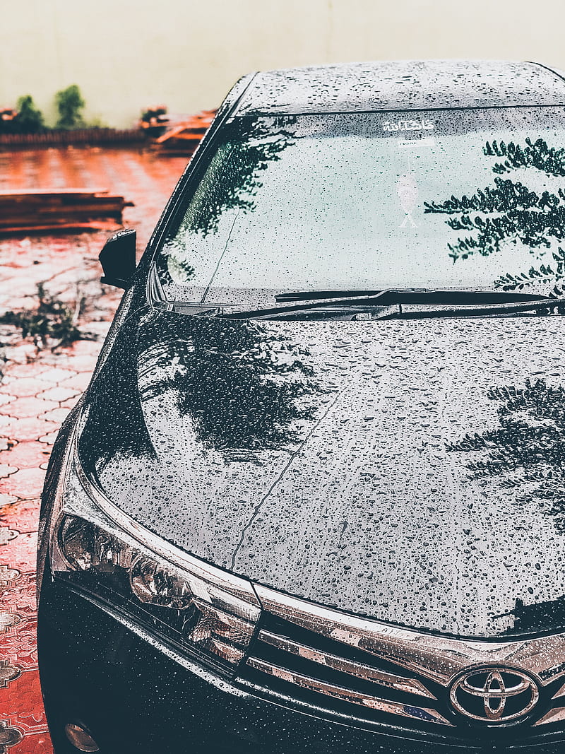 800x1067 Toyota Grande, black, corolla, drops, logo, pakistan, rain, super, toyota corolla, HD phone wallpaper
