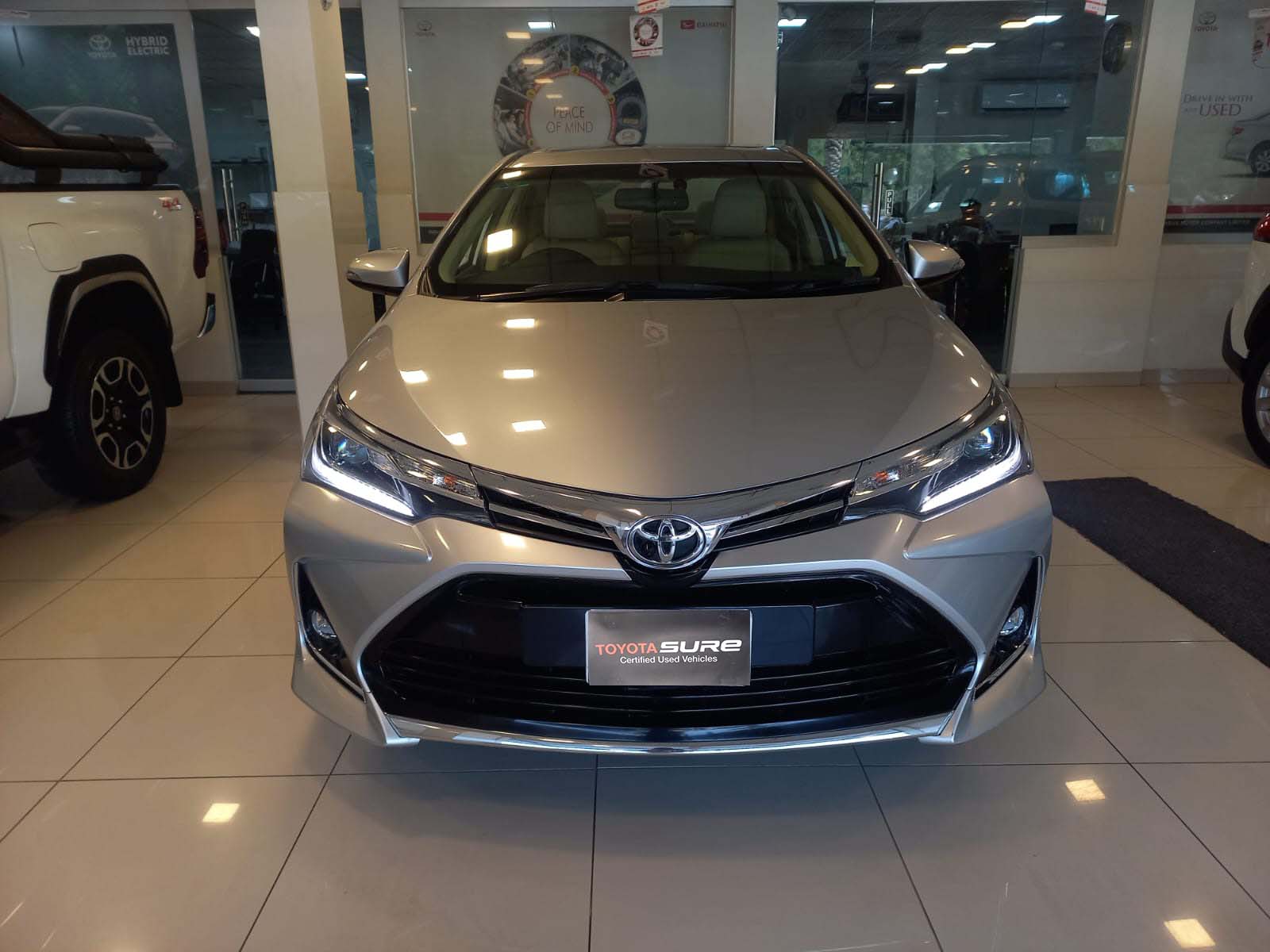 1600x1200 Corolla Altis 1.8L.8L GRANDE CVT (Beige Interior). Available in TOYOTA SURE. Central Certified Used Vehicles