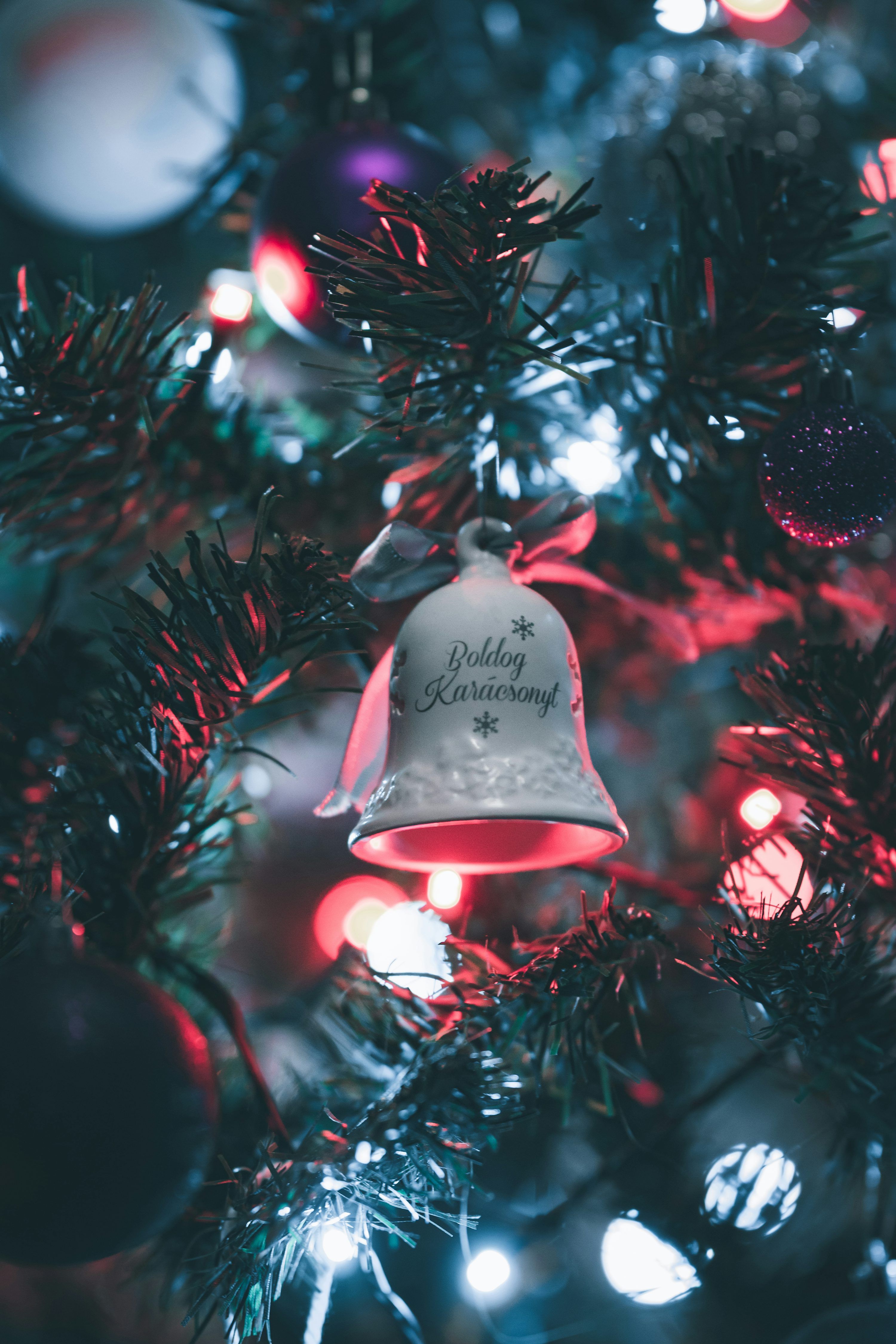 3000x4500 A christmas tree with a bell on it photo