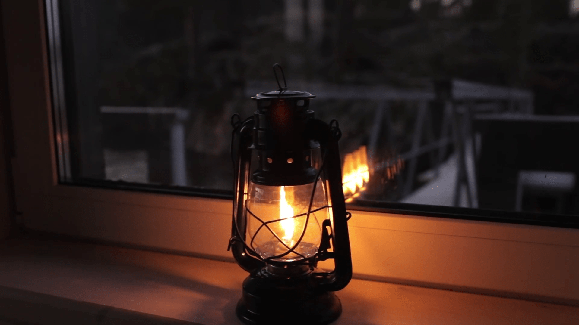 1920x1080 burning kerosene lantern on the window