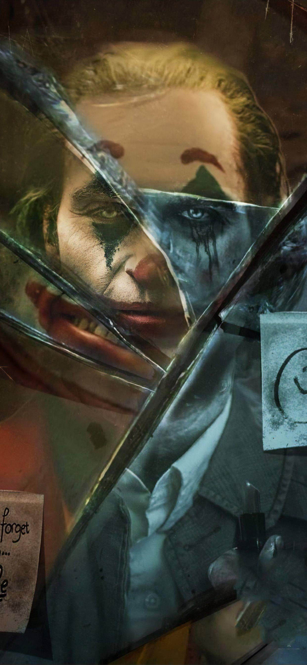 1242x2688 joker movie broken glass iPhone X Wallpaper Free Download
