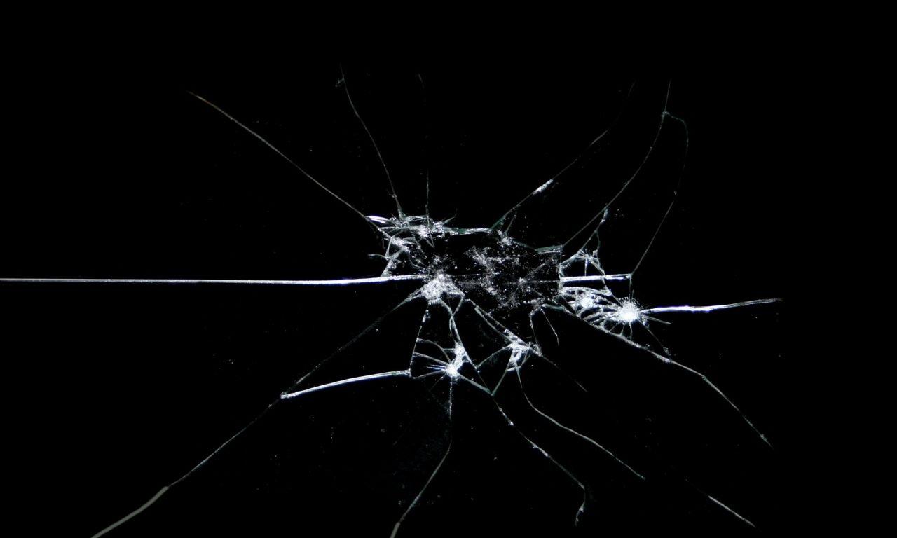1280x768 Broken glass shattered black background Wallpaper
