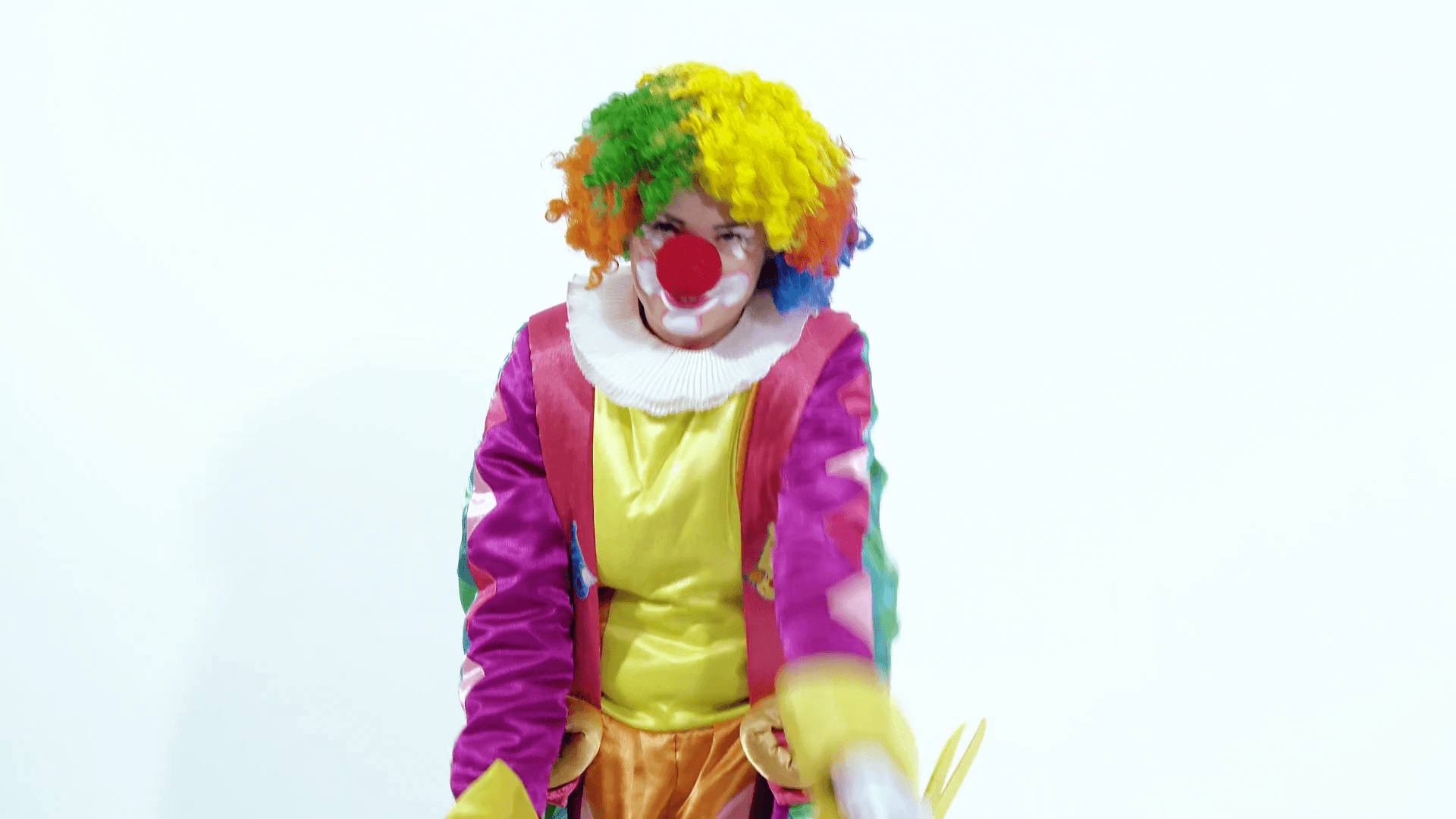 1920x1080 Funny young female clown dancing comically thinking she is pretty