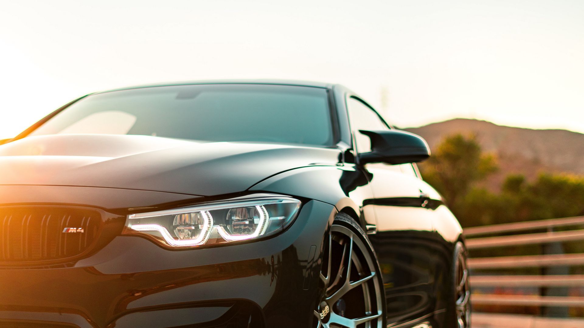 1920x1080 Download wallpaper 1920x1080 bmw m bmw, car, front view, headlight, black full hd, hdtv, fhd, 1080p HD background