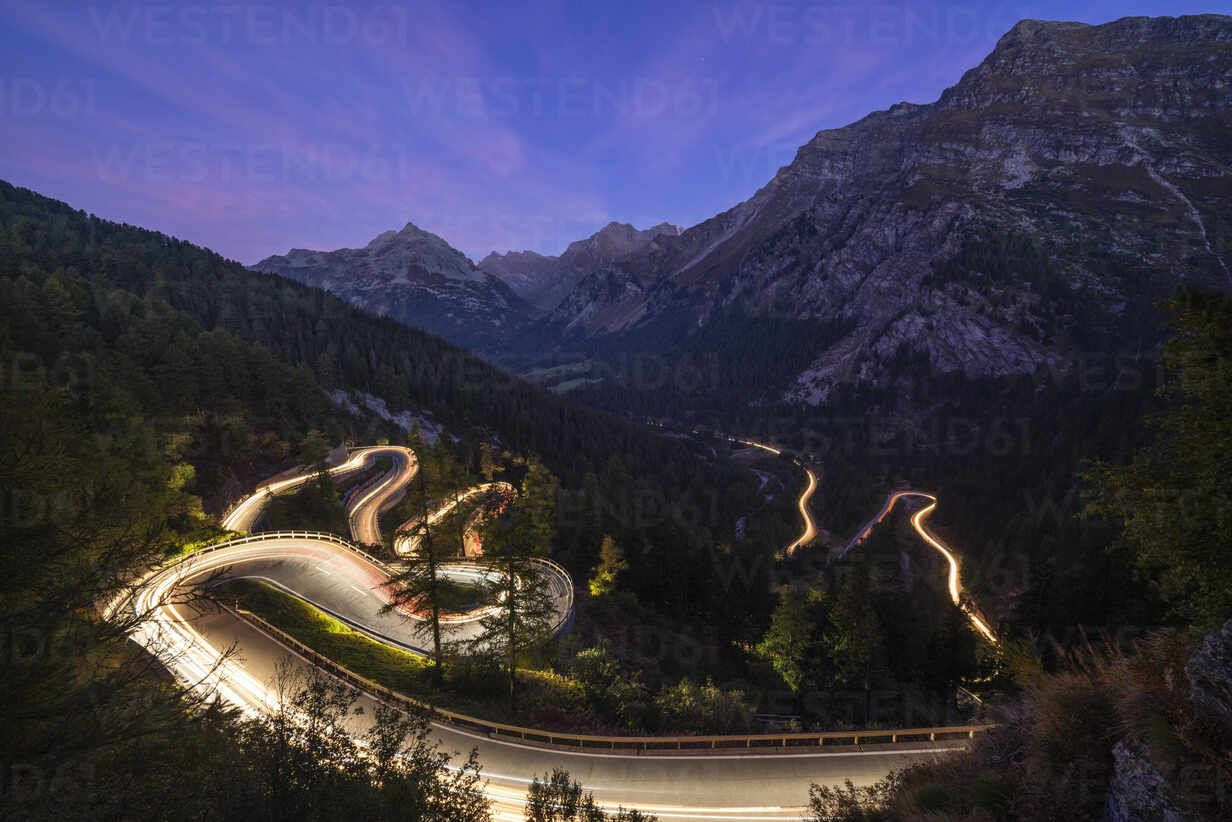 1232x822 Car trails lights on narrow bends of Maloja Pass mountain road, Engadine, Canton of Graubunden, Switzerland, Europe