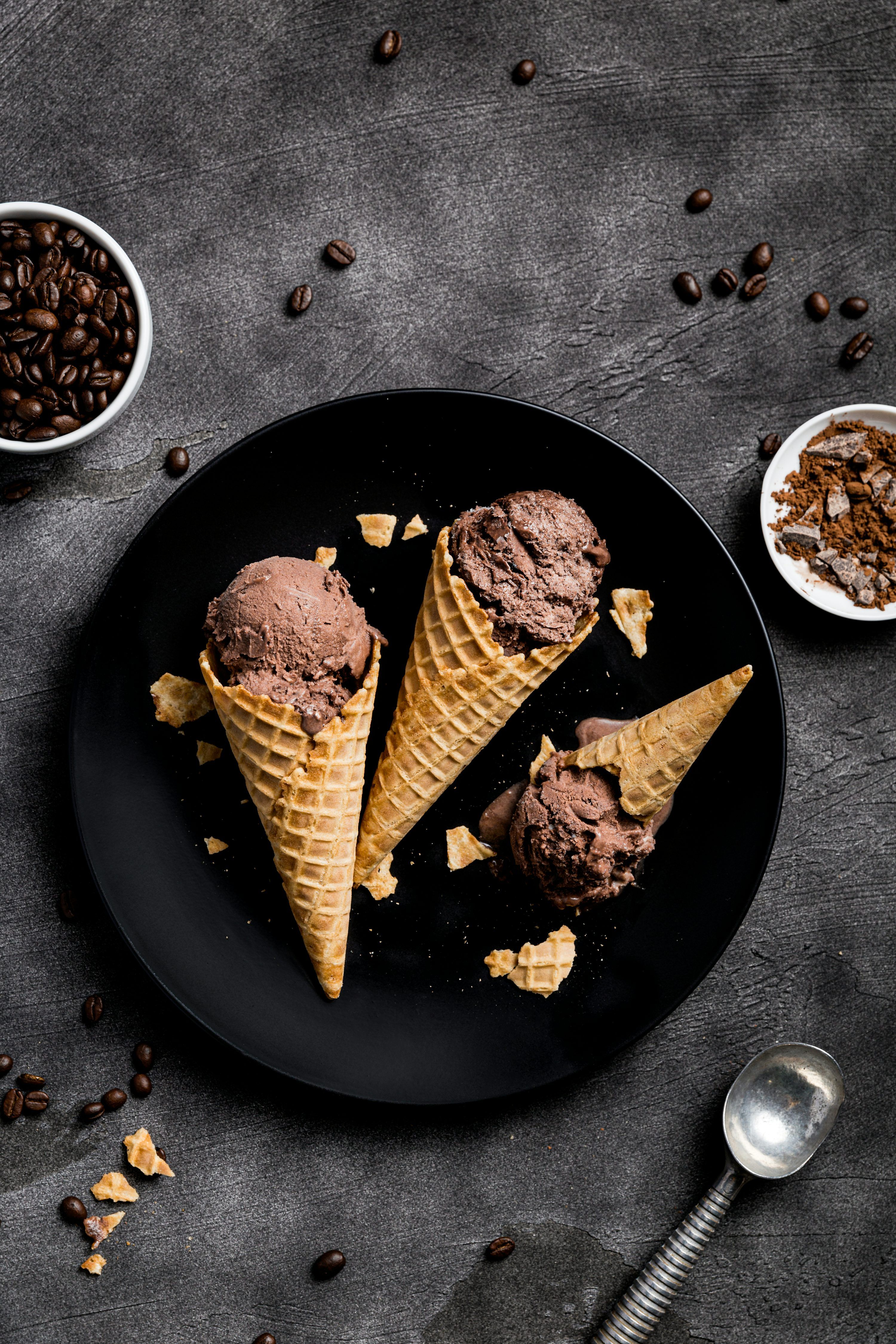 3000x4500 Waffle with chocolate ice cream on black round plate photo