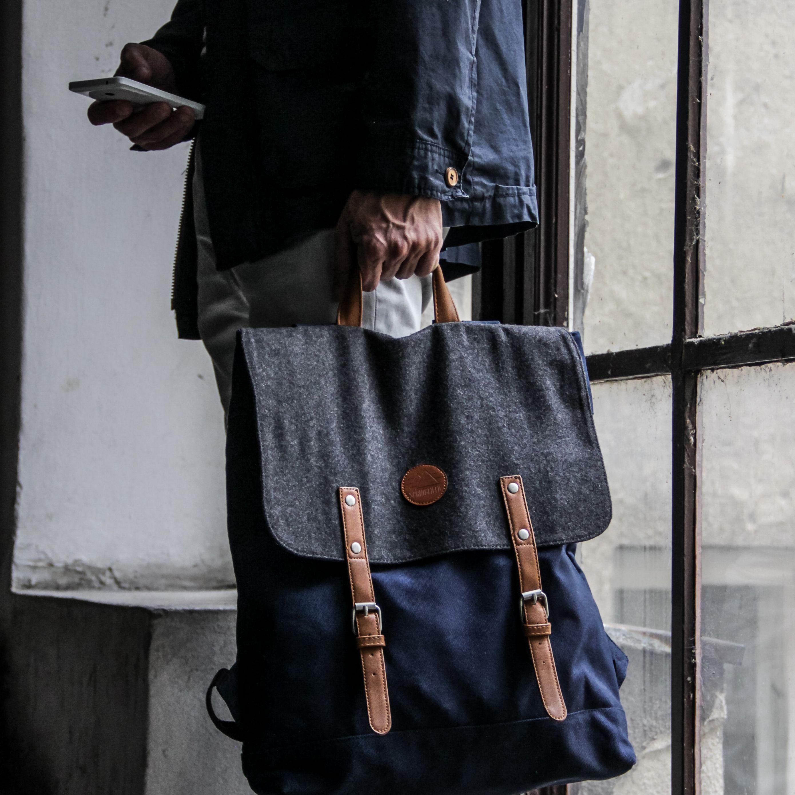2780x2780 Download wallpaper 2780x2780 man, window, backpack, style, fashion