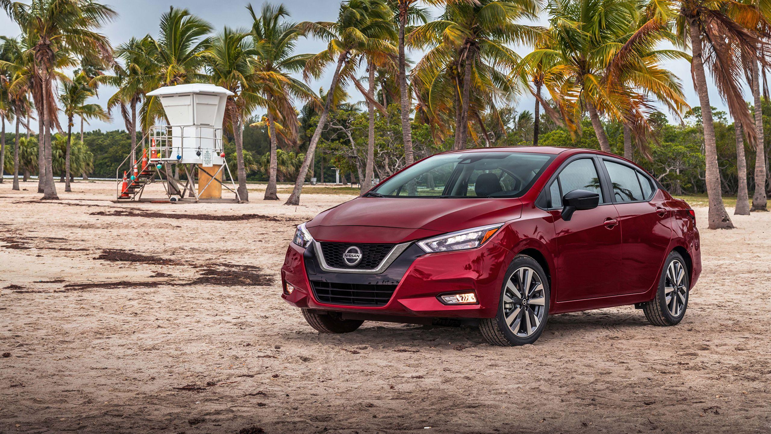 2560x1440 Desktop Wallpaper Nissan 2020 Versa SR maroon automobile 2560x1440