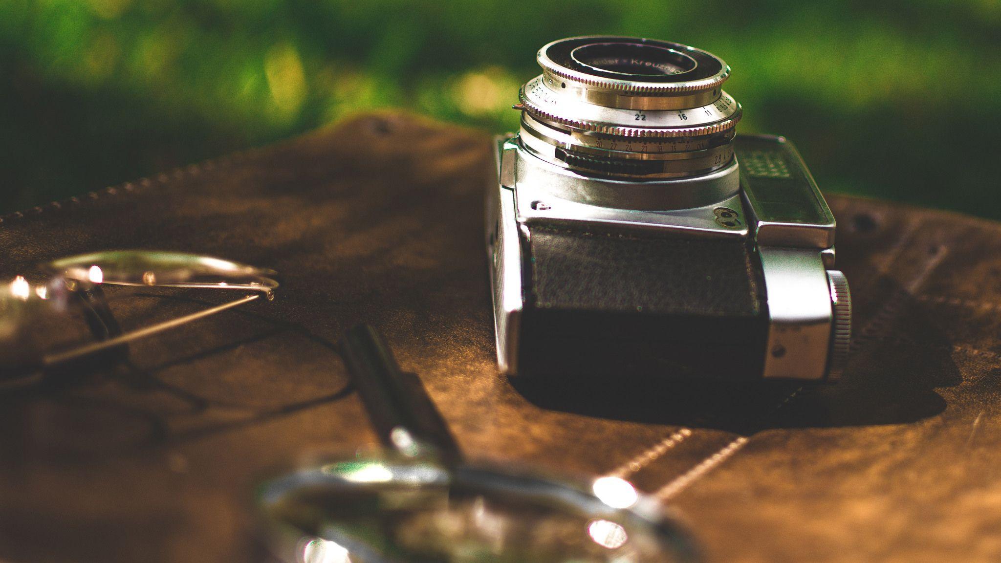 2048x1152 Retro Old Camera Magnifying Glass 2048x1152 Resolution