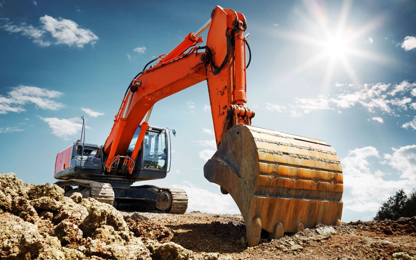 1440x900 Excavator with bucket against a blue sky Desktop wallpaper 1440x900