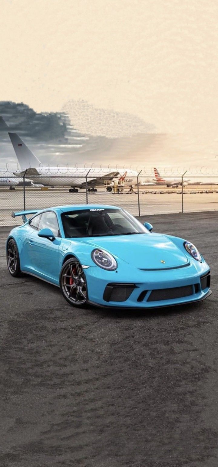 720x1544 Blue Sports Car Wallpaper