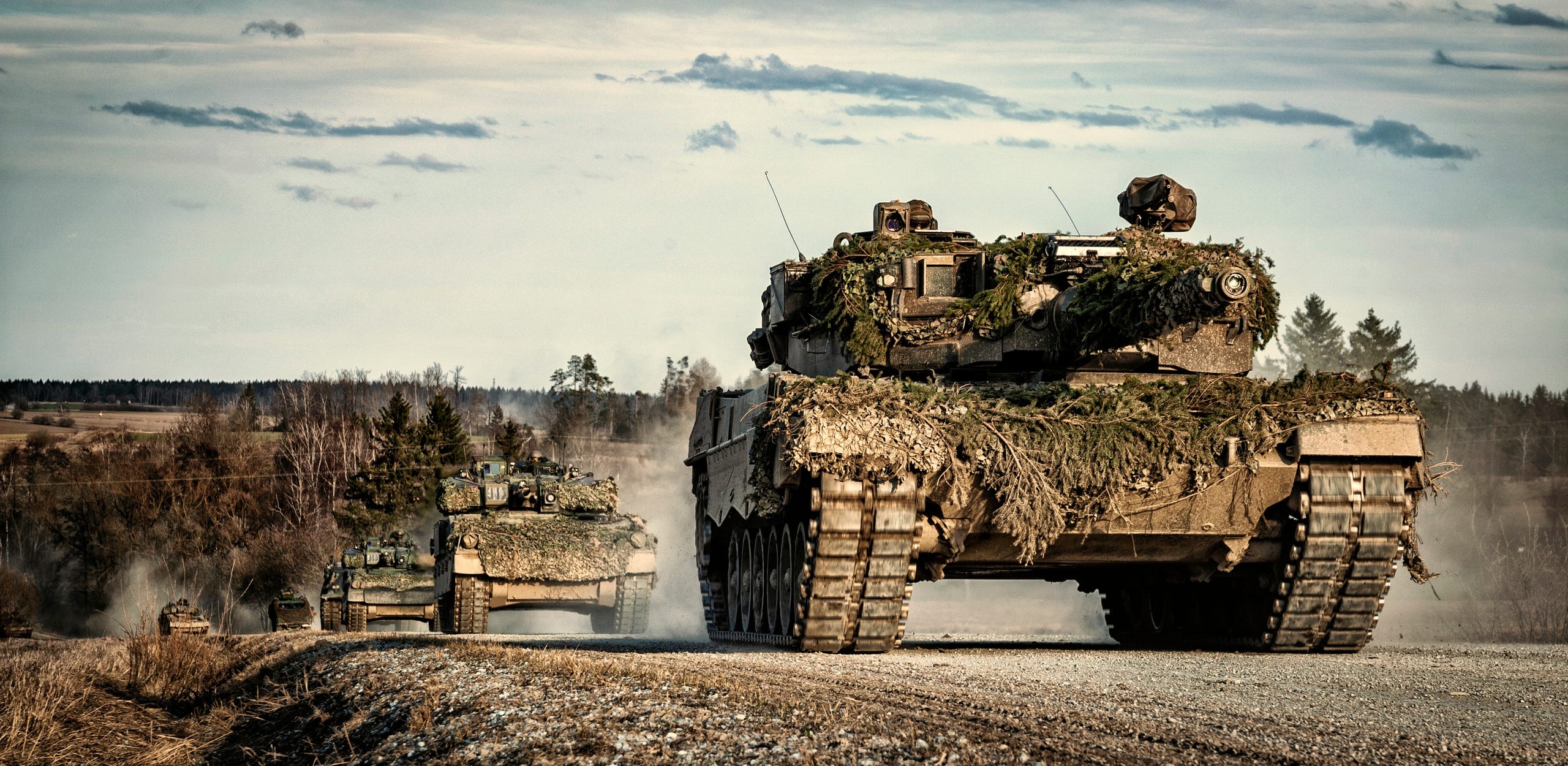 2560x1250 Leopard 2A4 of the Panzerbataillon 14 and Ulan of the Panzergrenadierbataillon 13 during a manoeuvre at the military training area Allentsteig. Lower Austria, May 2020 (2560x1250)