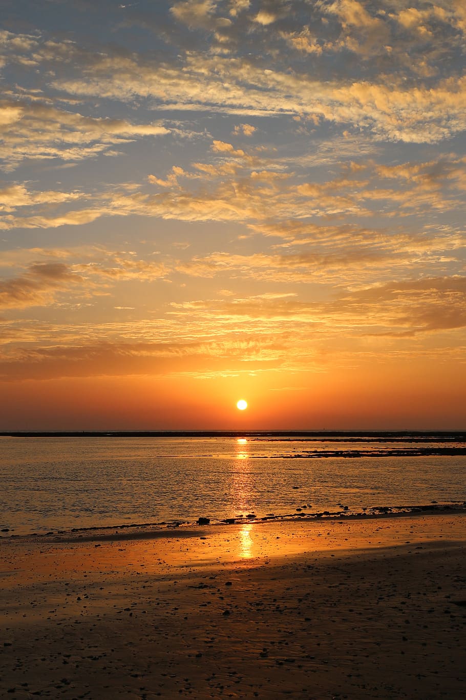 910x1365 sunset, sea, ray of sunshine, beach, sun, sand, water, the light of the sun