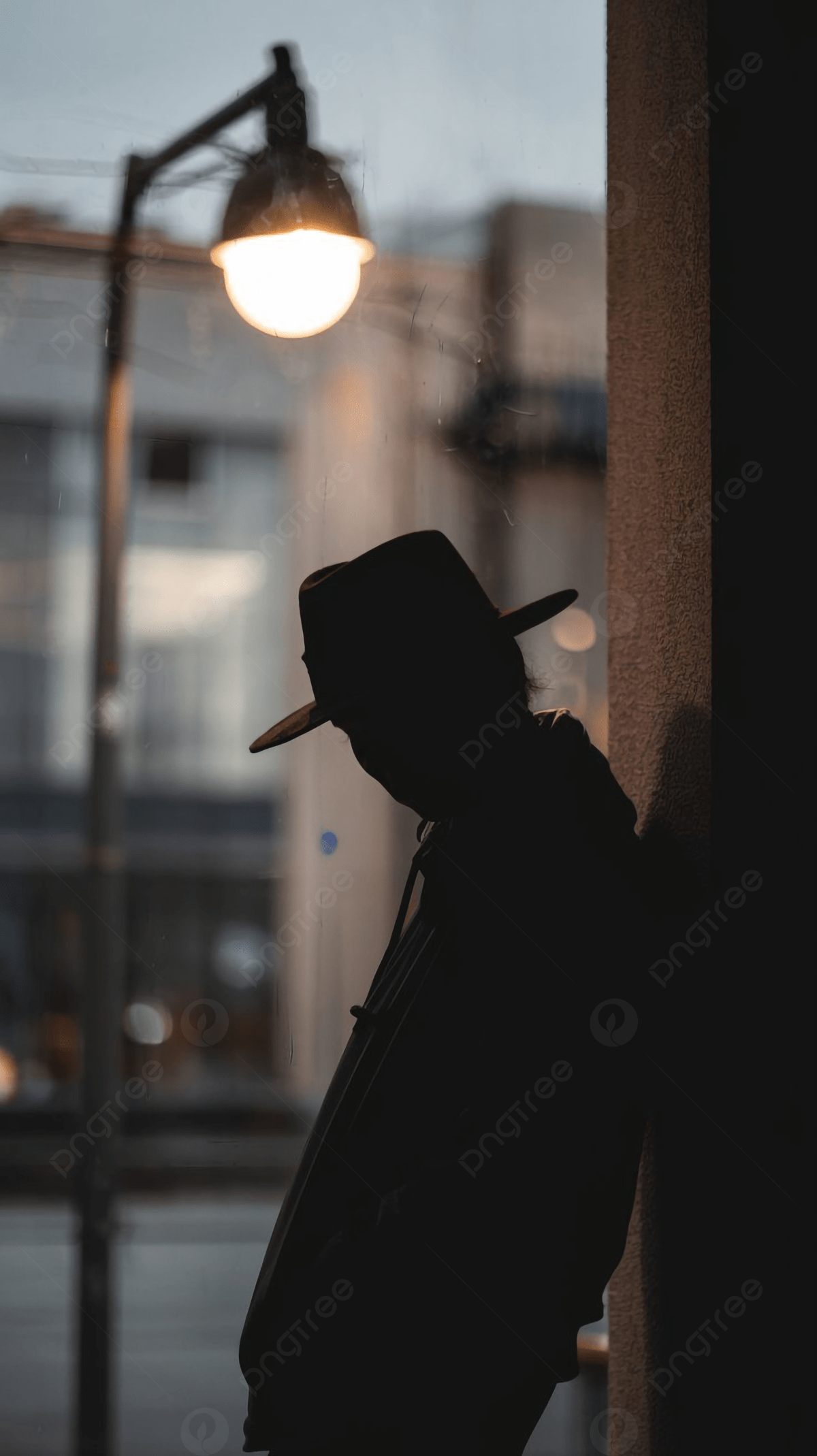 1200x2139 Man Standing Alone Under A Lamp Background Wallpaper Image For Free Download