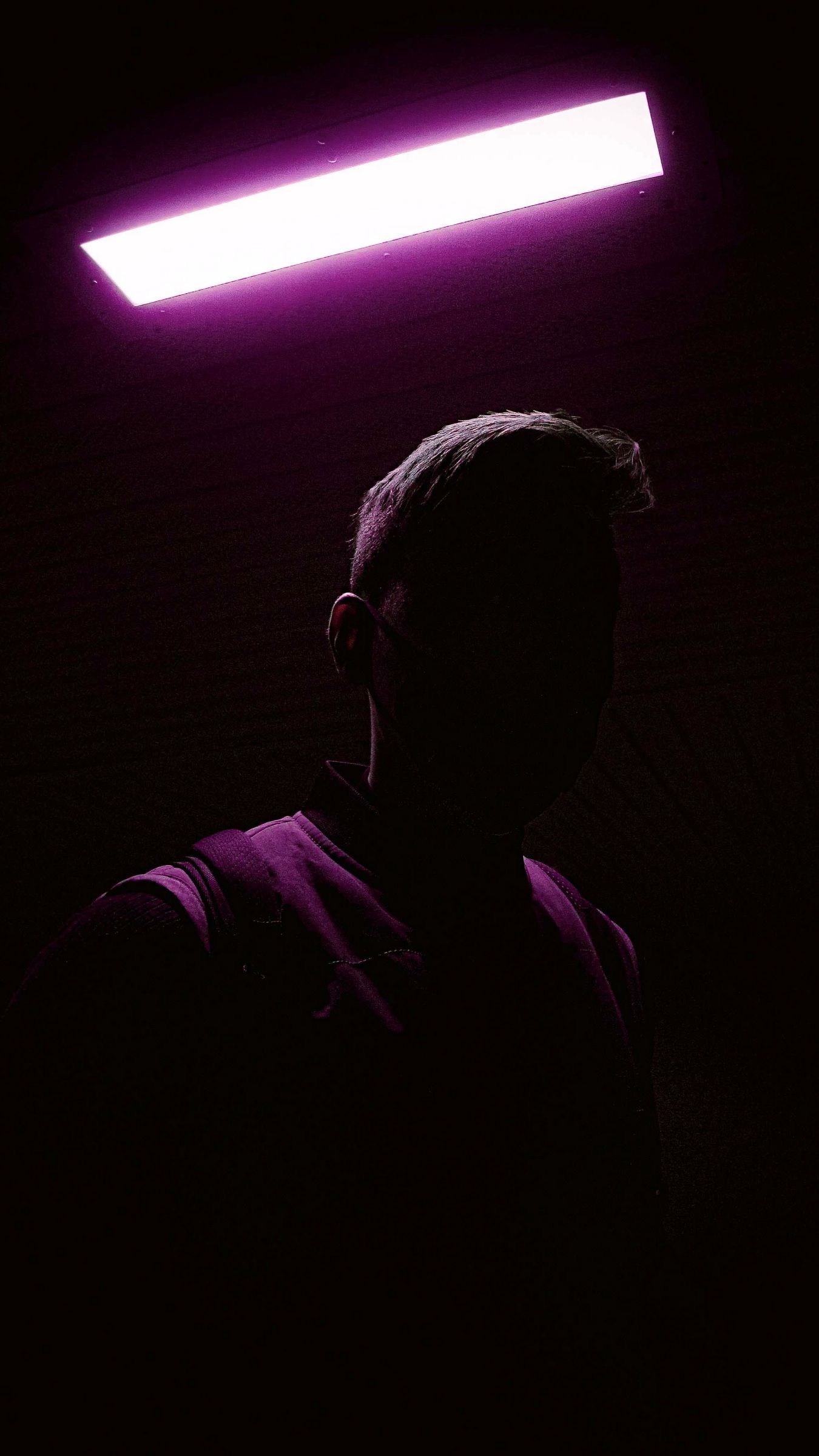 1350x2400 Download wallpaper 1350x2400 man, shadow, neon, glow iphone 8+/7+/6s+/for parallax HD background