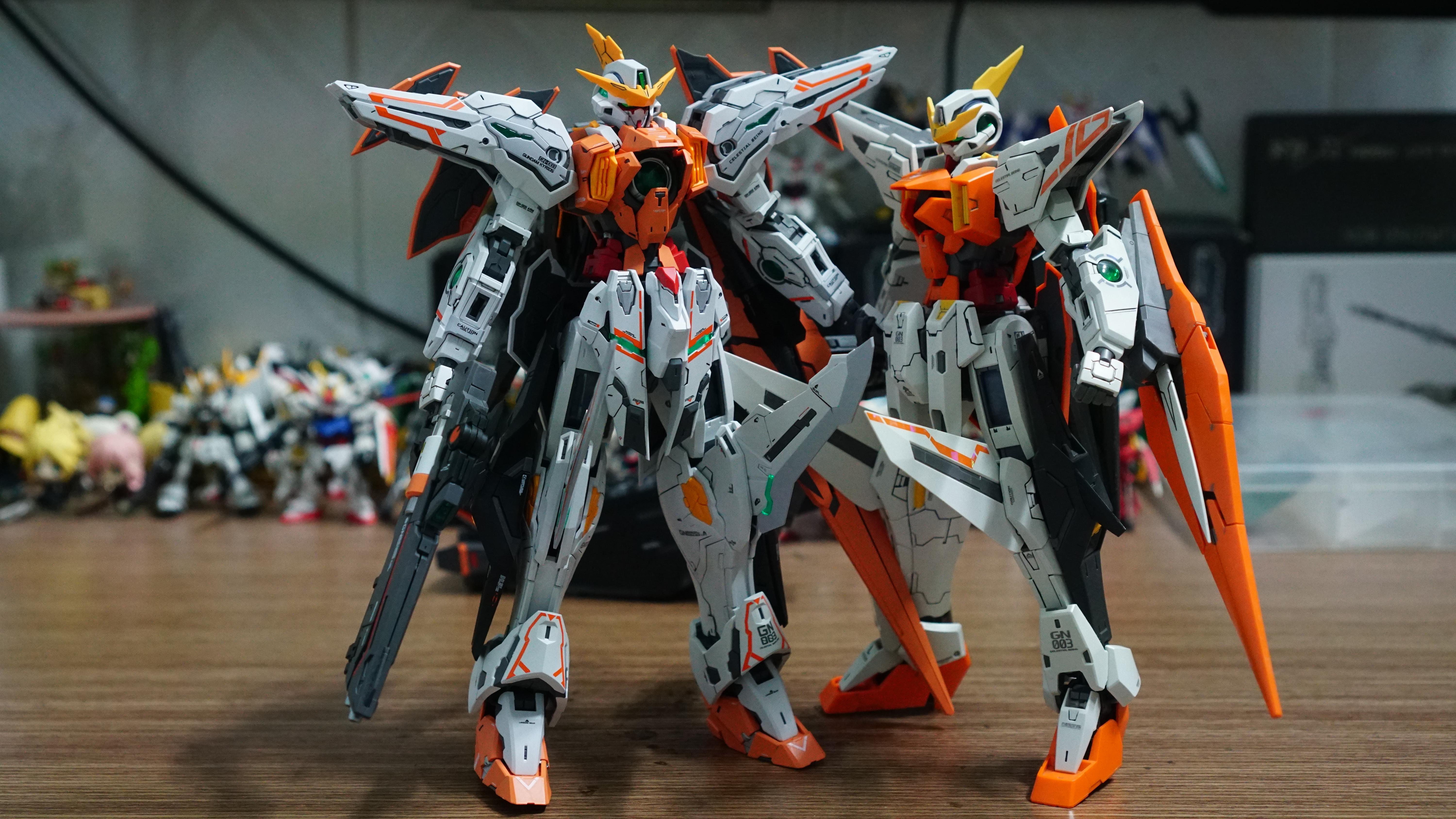 6000x3376 MG Kyrios From Super Soldier Project X Bandai Side By Side Comparison