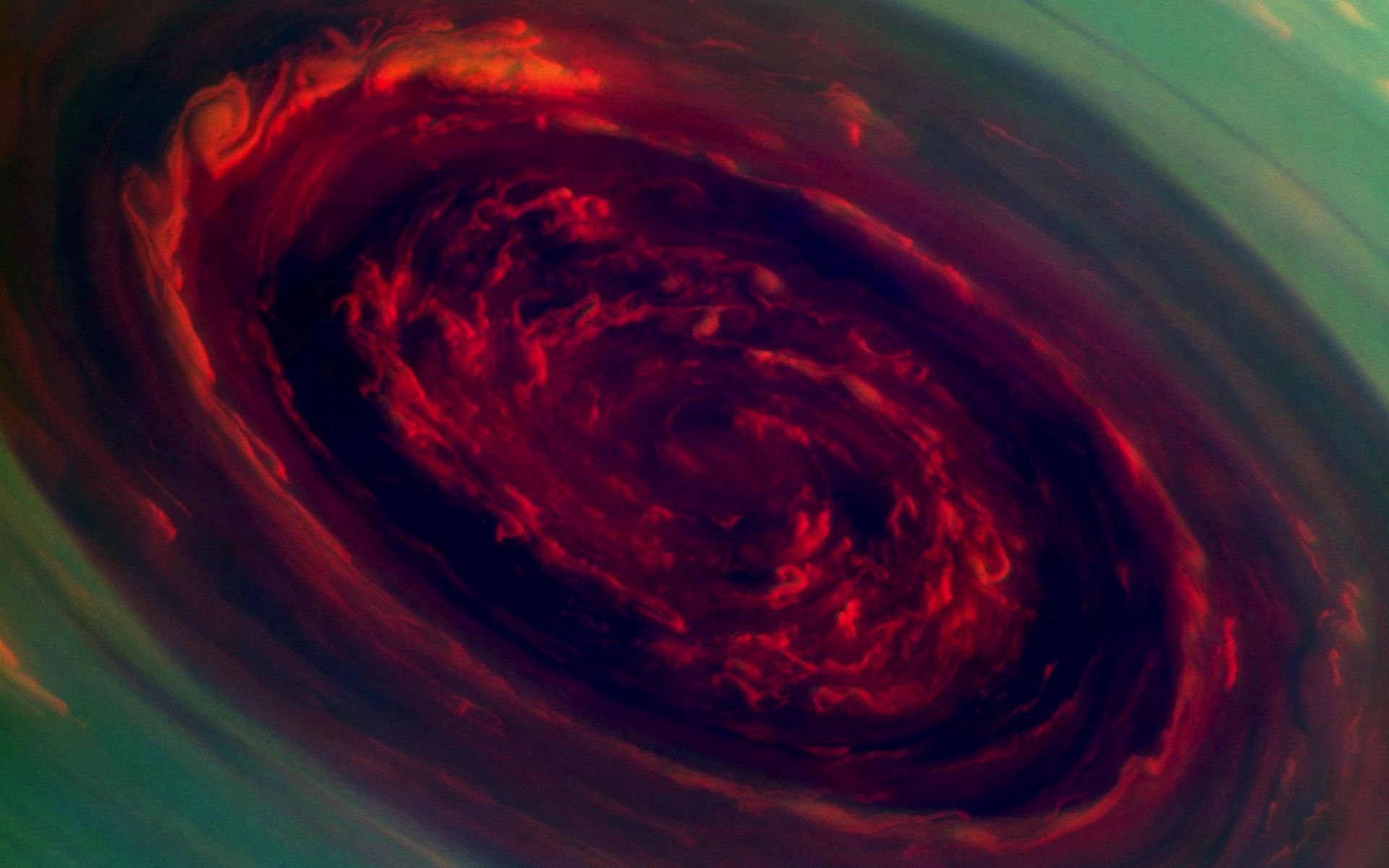1920x1200 Saturn's Spiraling Storm Wallpaper
