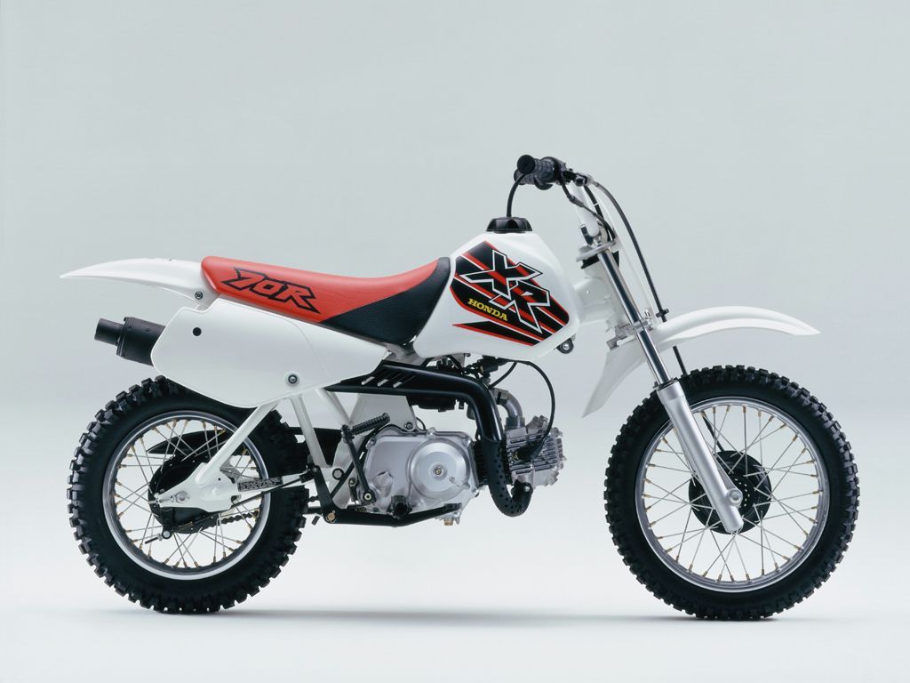 1024x768 The Honda 70 at MotorBikeSpecs.net, the Motorcycle Specification Database