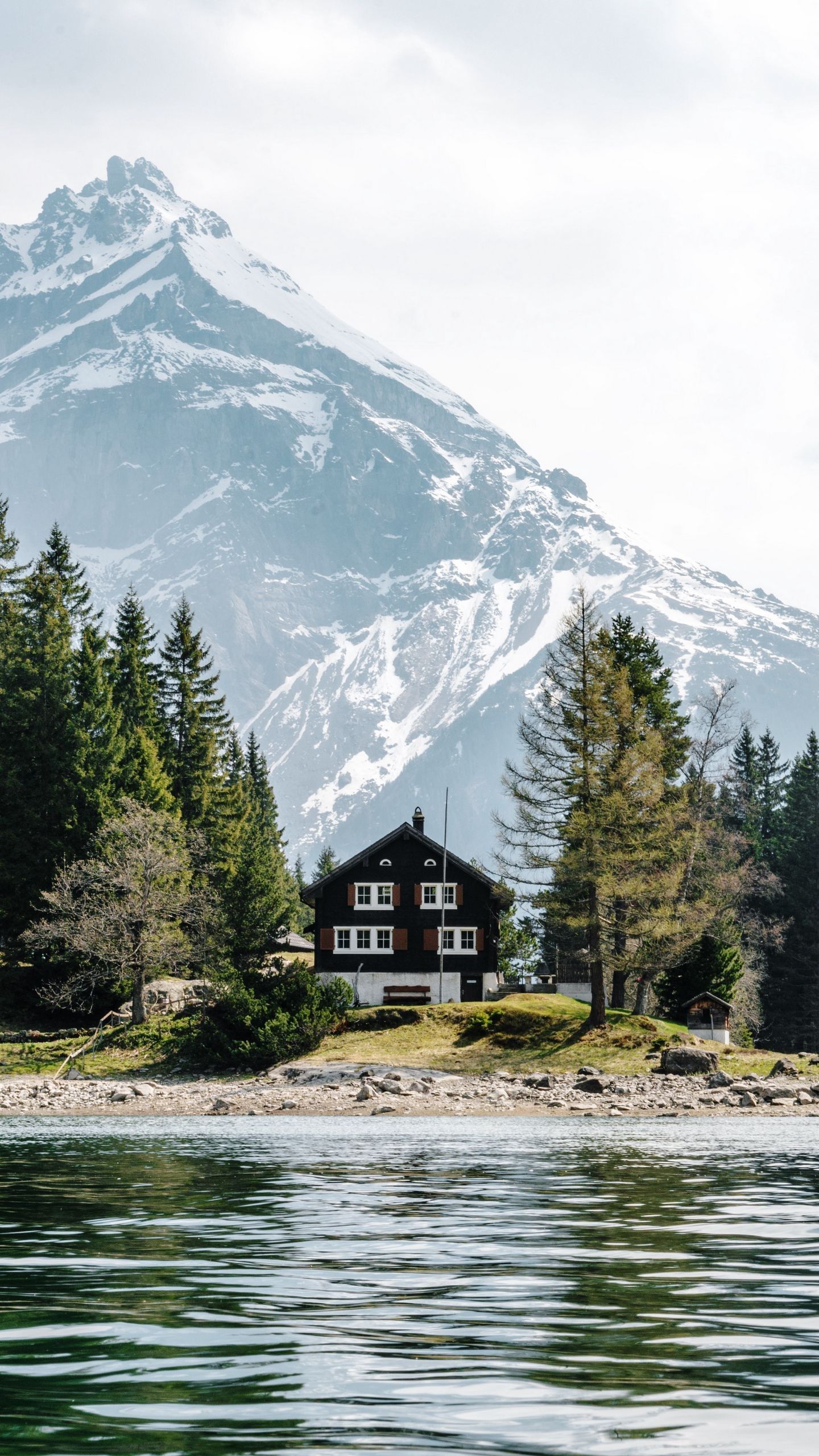 1440x2560 House Lake Mountain Trees Shore Landscape Snow Greenery Mountain 4K HD Nature Wallpaper