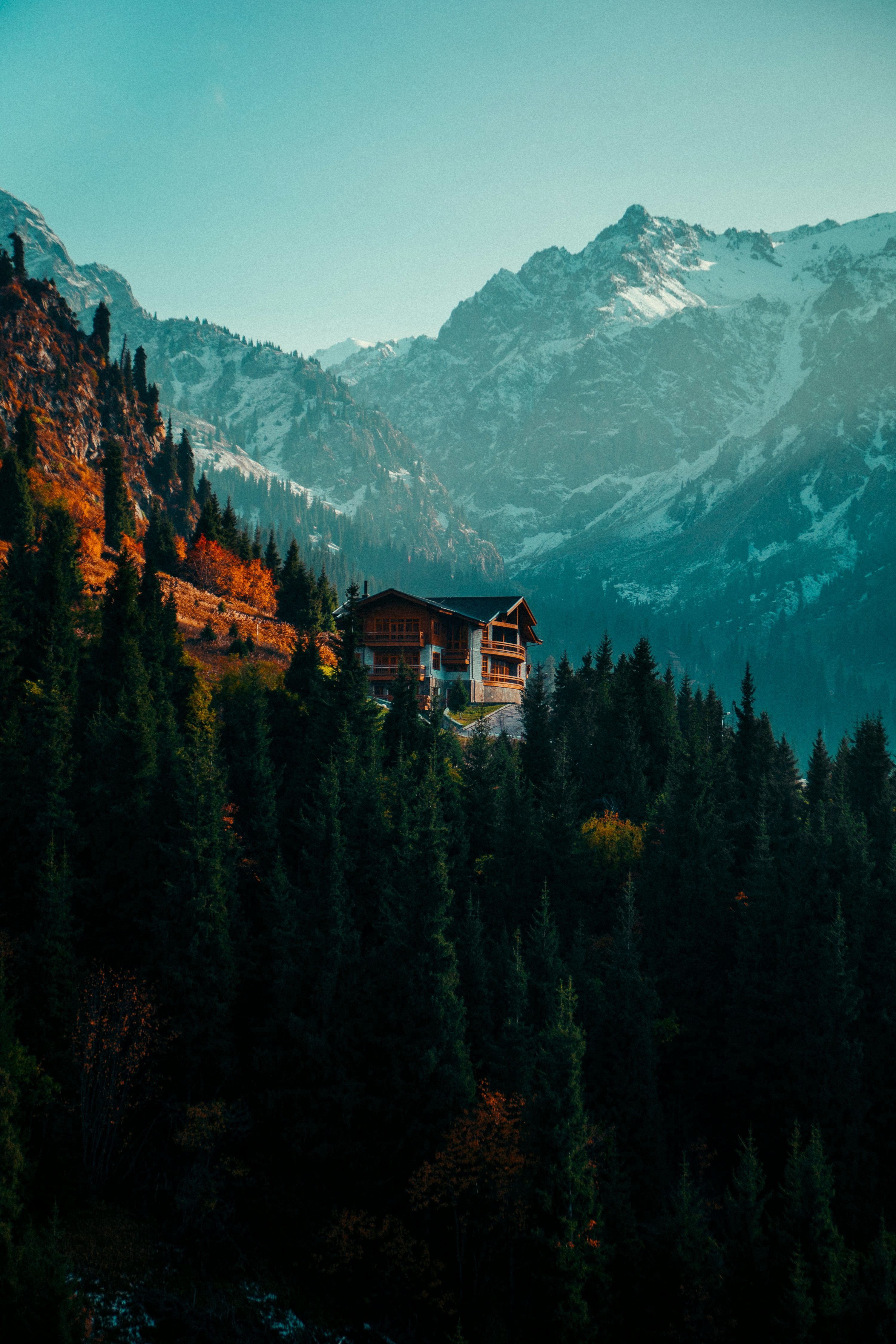 3000x4500 A house on top of a mountain surrounded