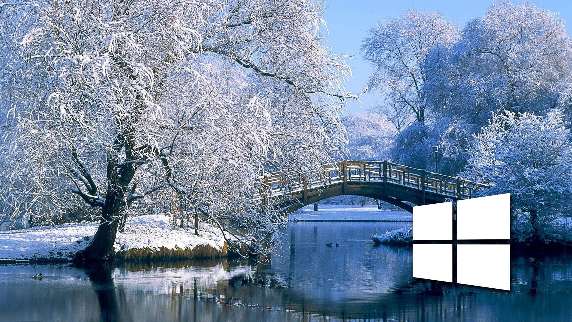 1920x1080 Windows 10 on the snowy lake simple white logo wallpaper