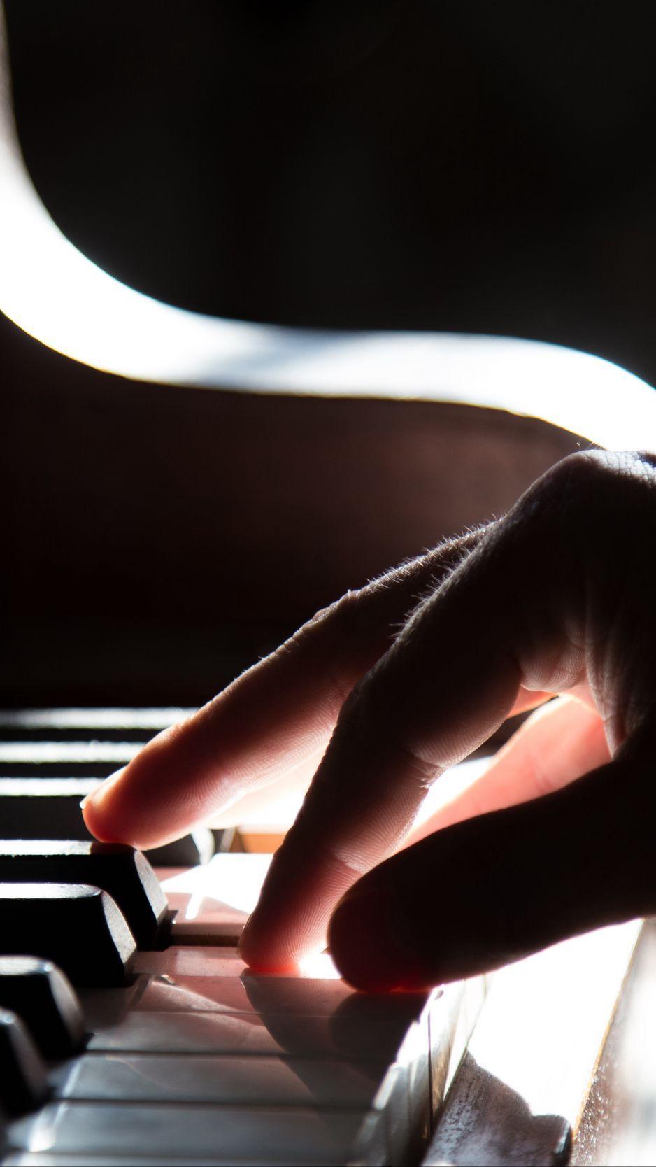 938x1668 Download wallpaper 938x1668 piano, hand, piano keys, shadow iphone