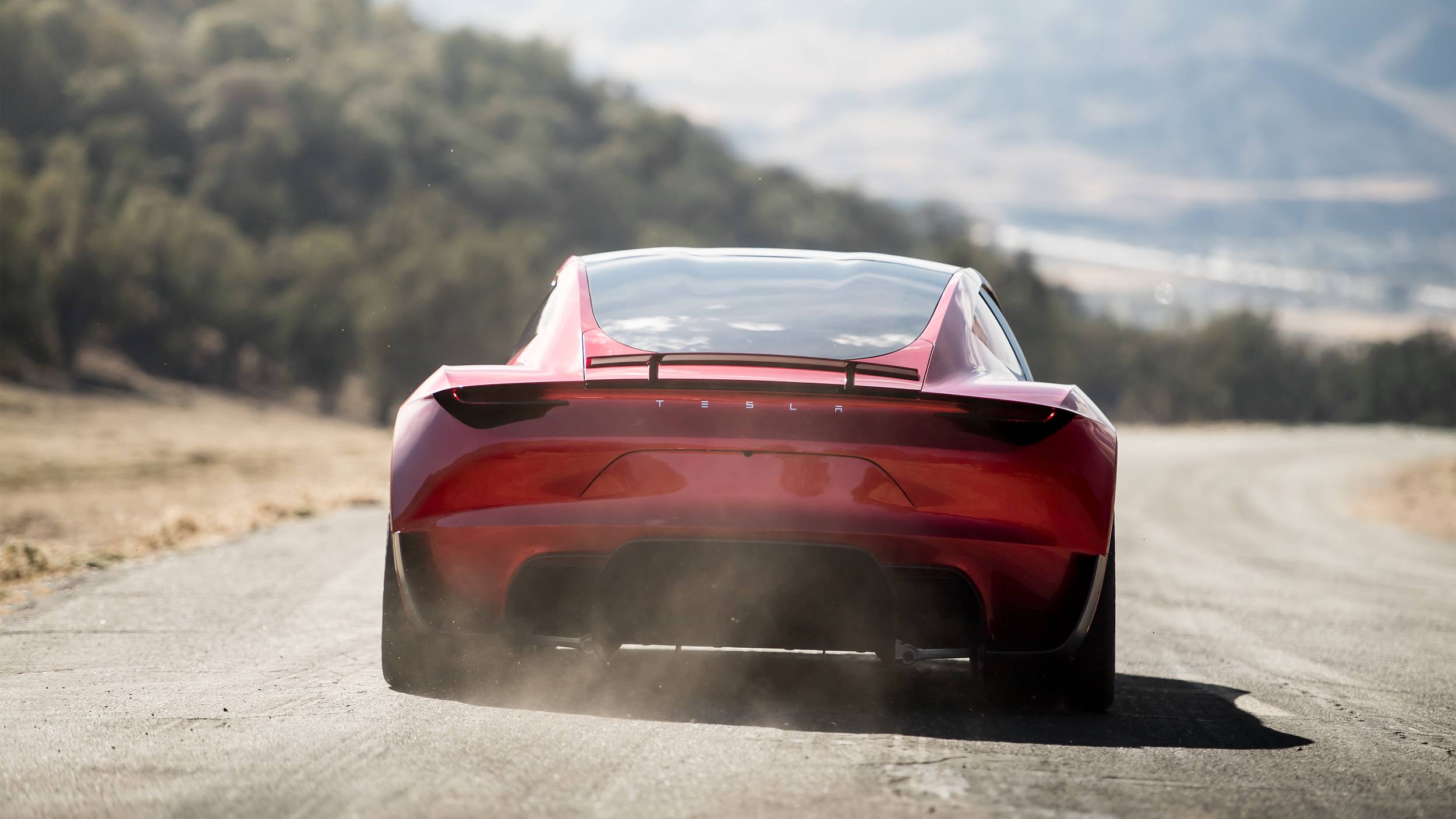 2500x1406 Tesla Roadster rear view red color HD wallpaper