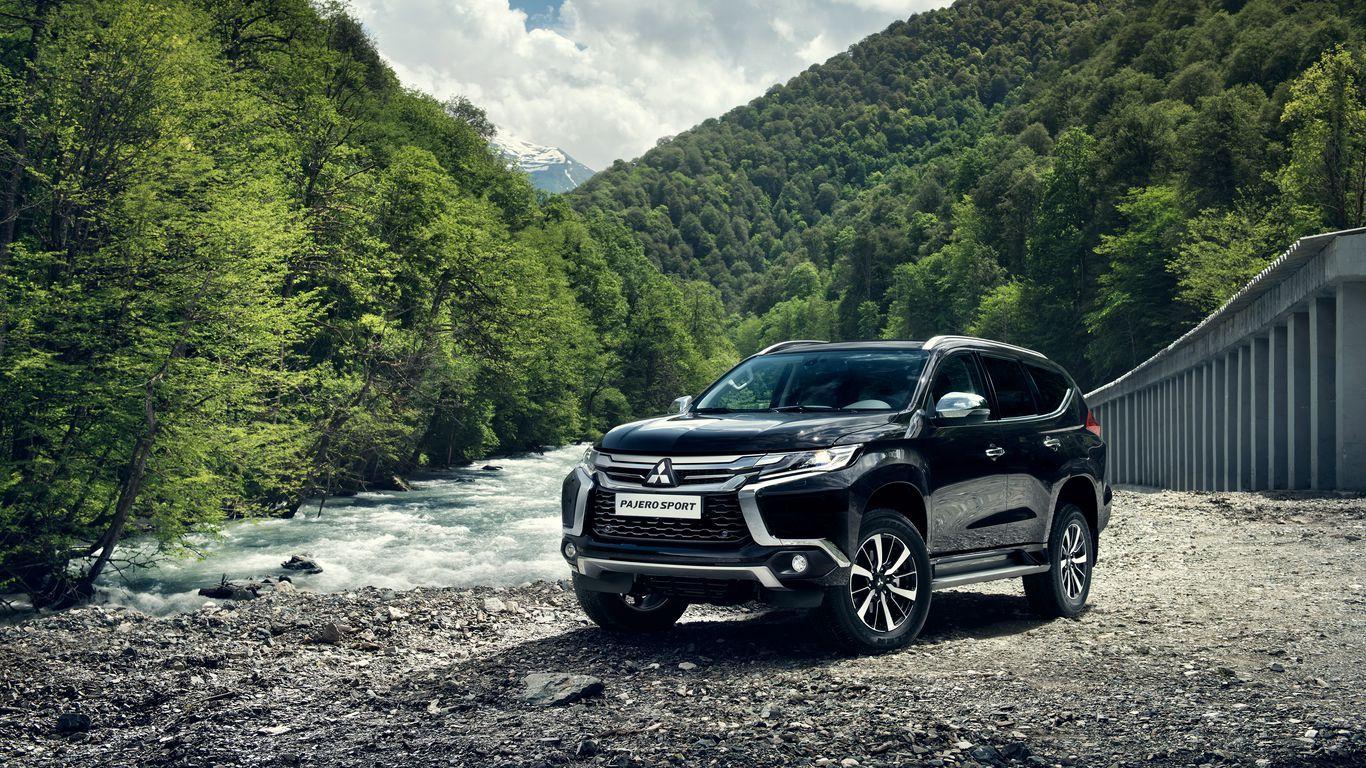 1366x768 Download wallpaper 1366x768 mitsubishi pajero, suv, mountains tablet, laptop HD background