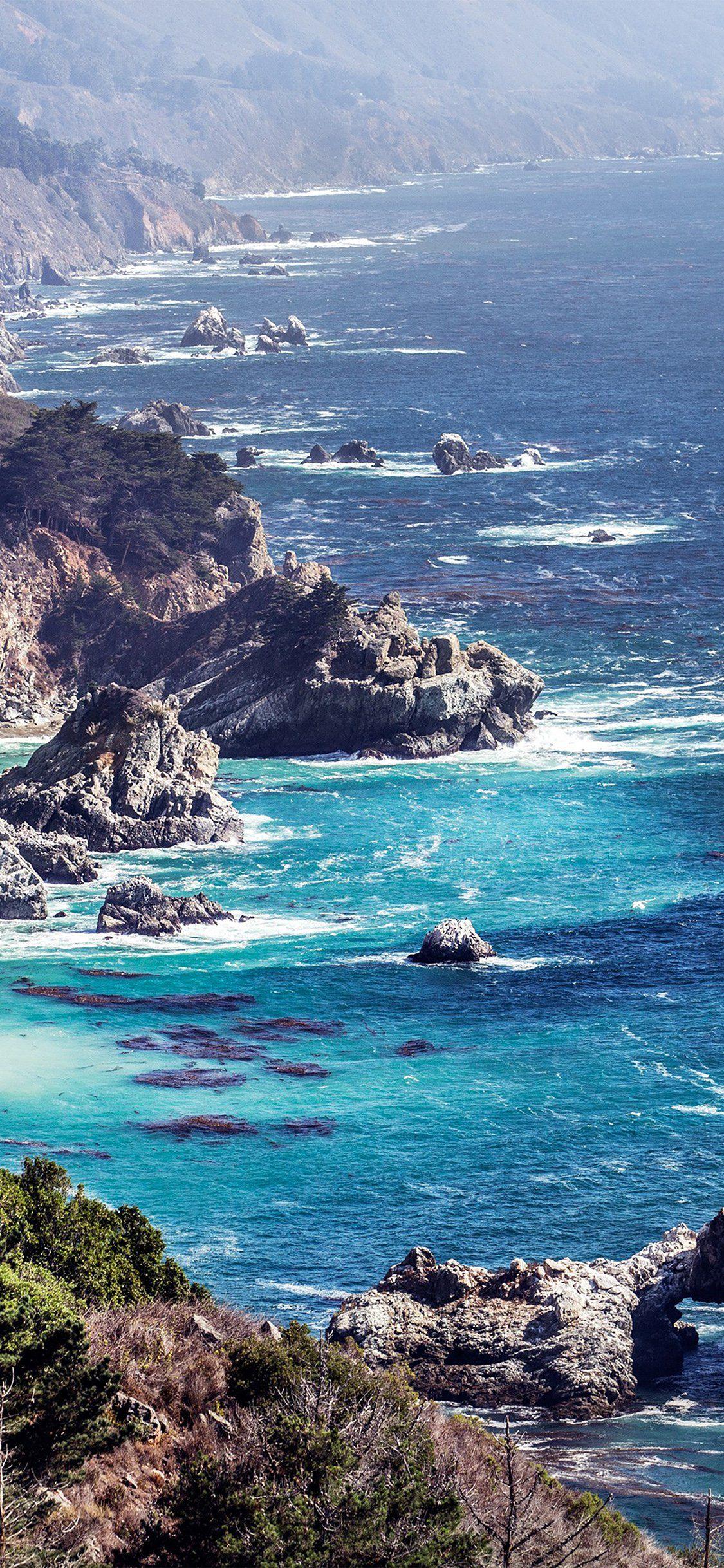 1125x2436 Ocean rock iPhone Wallpaper Free Download