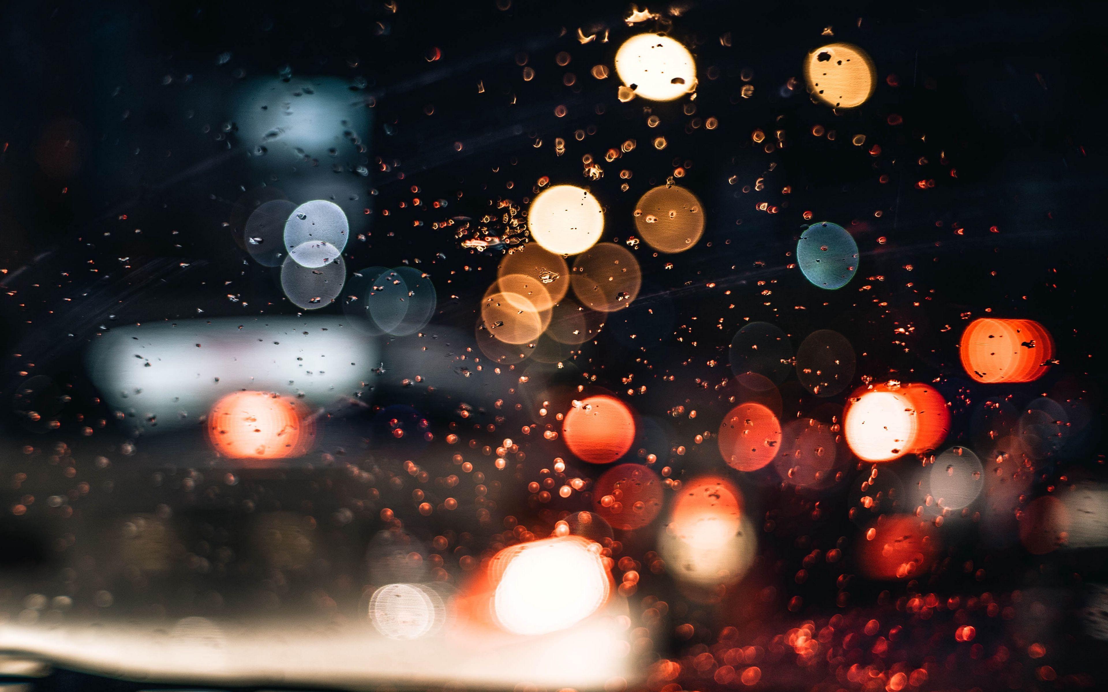 3840x2400 Download wallpaper 3840x2400 bokeh, glare, drops, glass