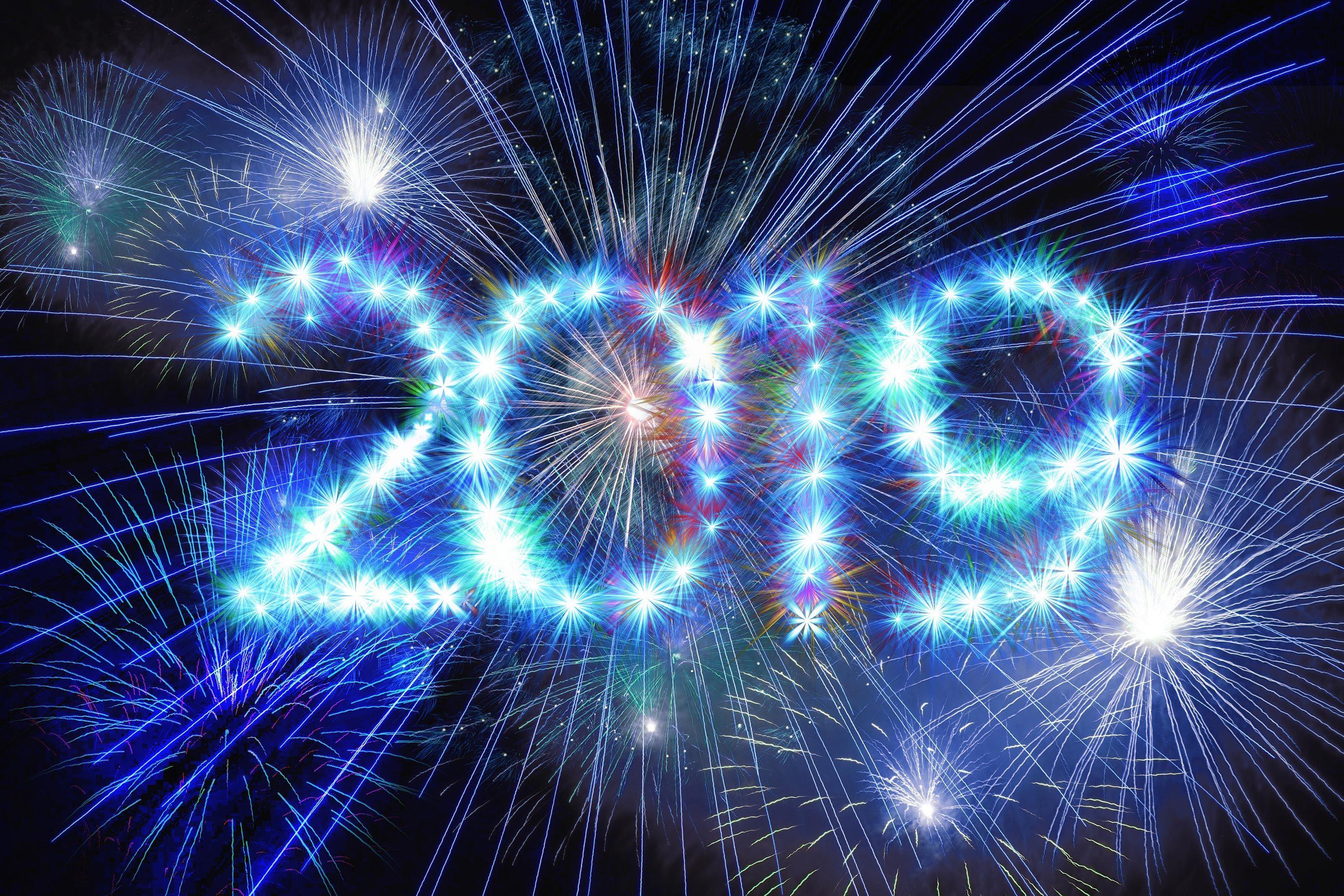 3000x2000 Blue fireworks on the sky New Year 2019