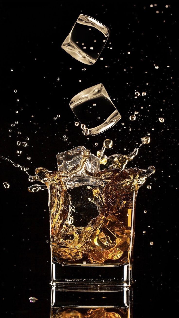 736x1308 Glass and ice. Whiskey aesthetic wallpaper, Drink background design, Splash photography