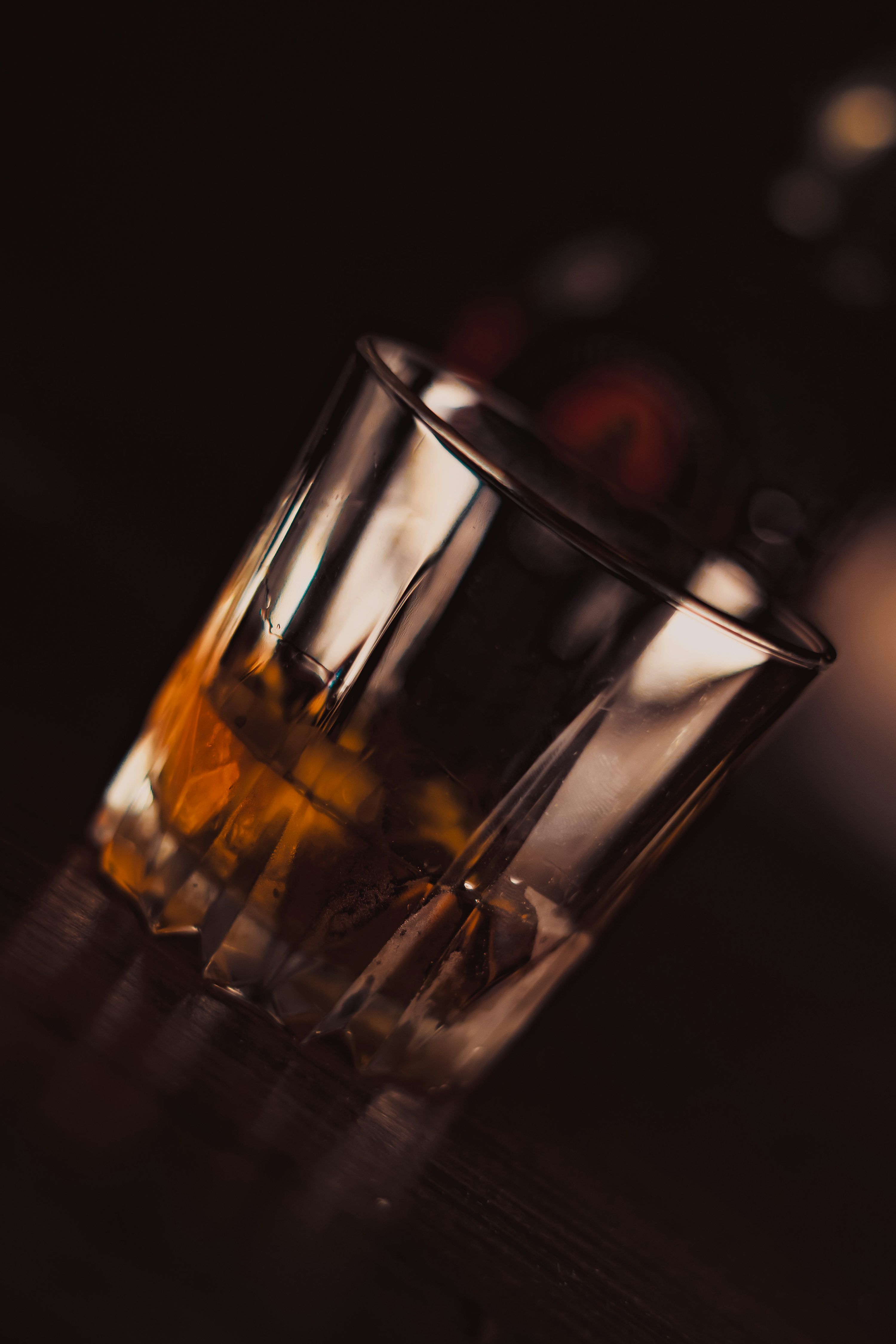 3000x4500 Clear shot glass with yellow liquid photo