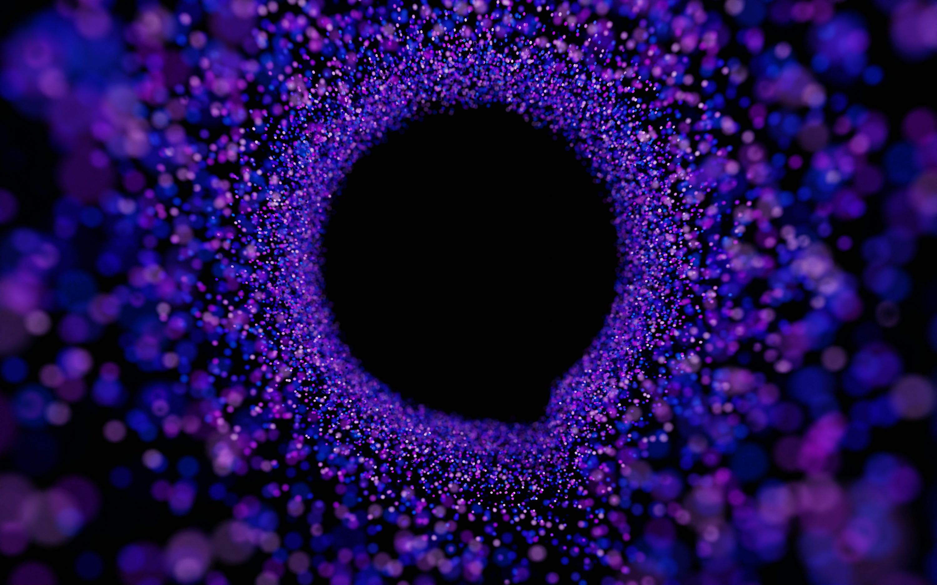 3000x1875 A black hole in the center of a purple background photo