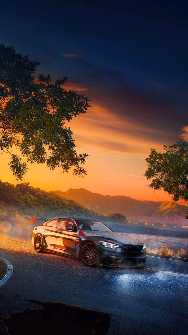 736x1308 BMW M4 driving in the sunset street. HD wallpaper for Phones