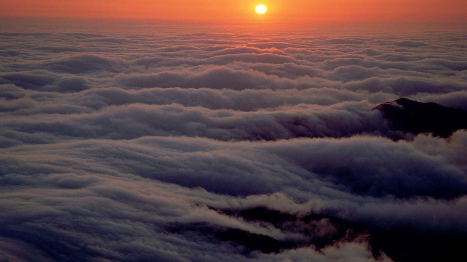 1600x900 Sunset in the mountains above the clouds Desktop wallpaper 1600x900