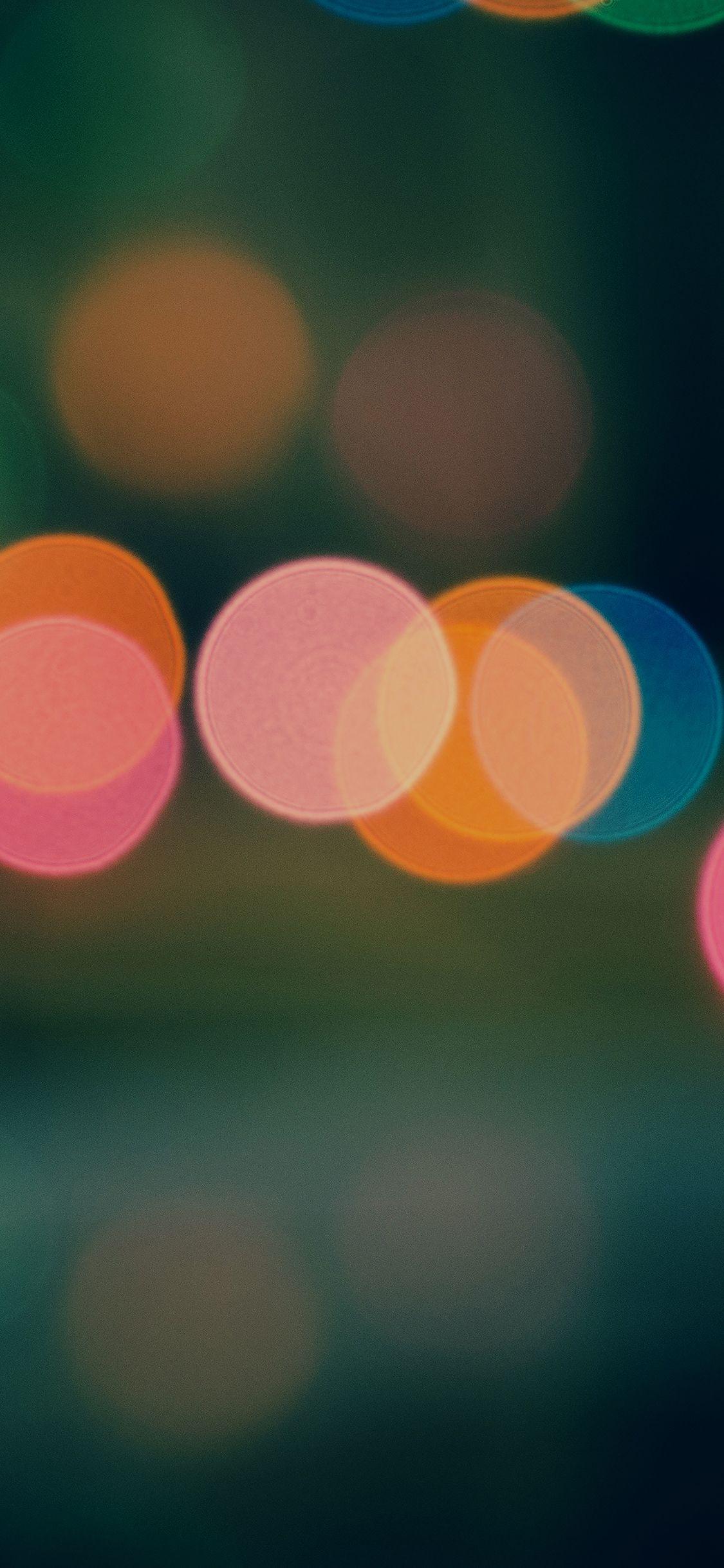 1125x2436 iPhone X wallpaper. light bokeh dark blur pattern