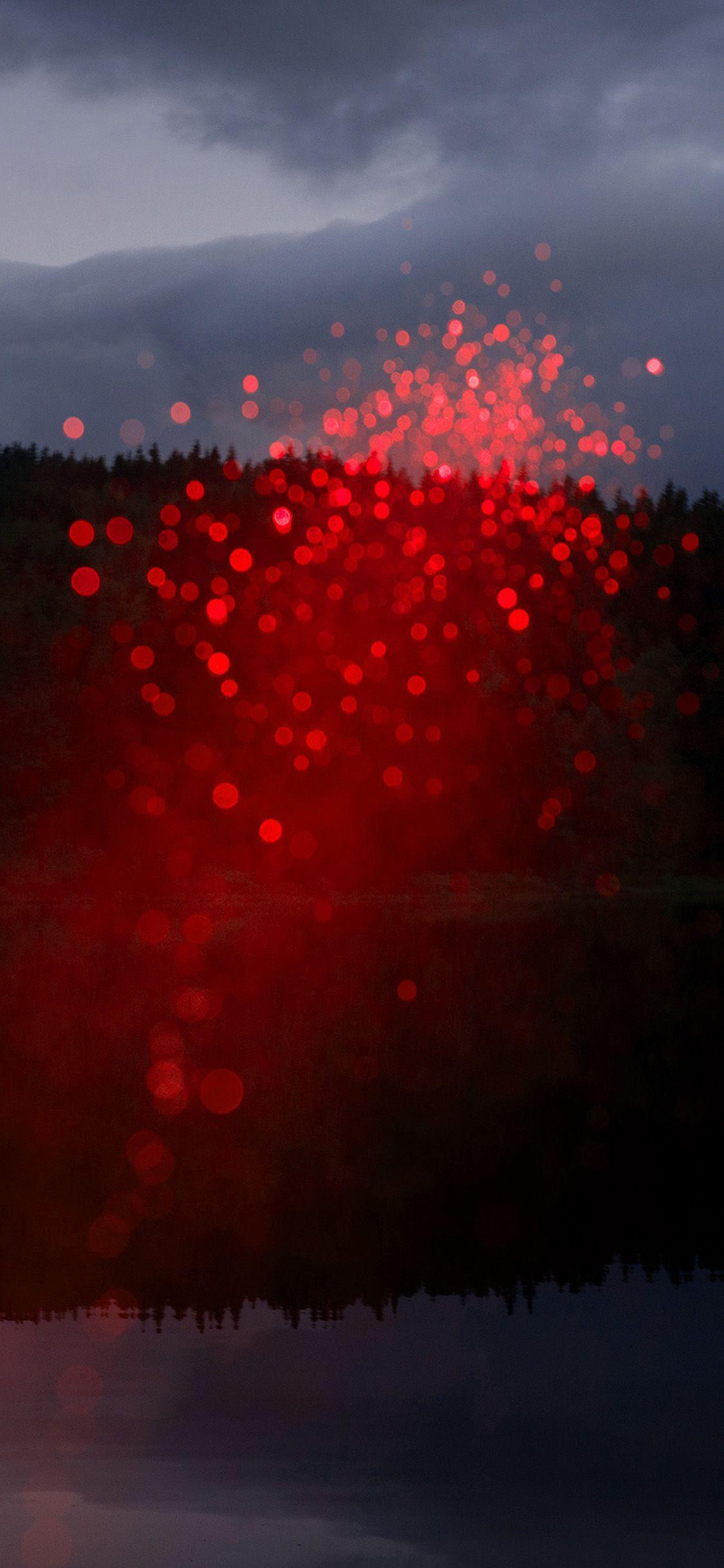 1125x2436 mountain red light bokeh pattern background