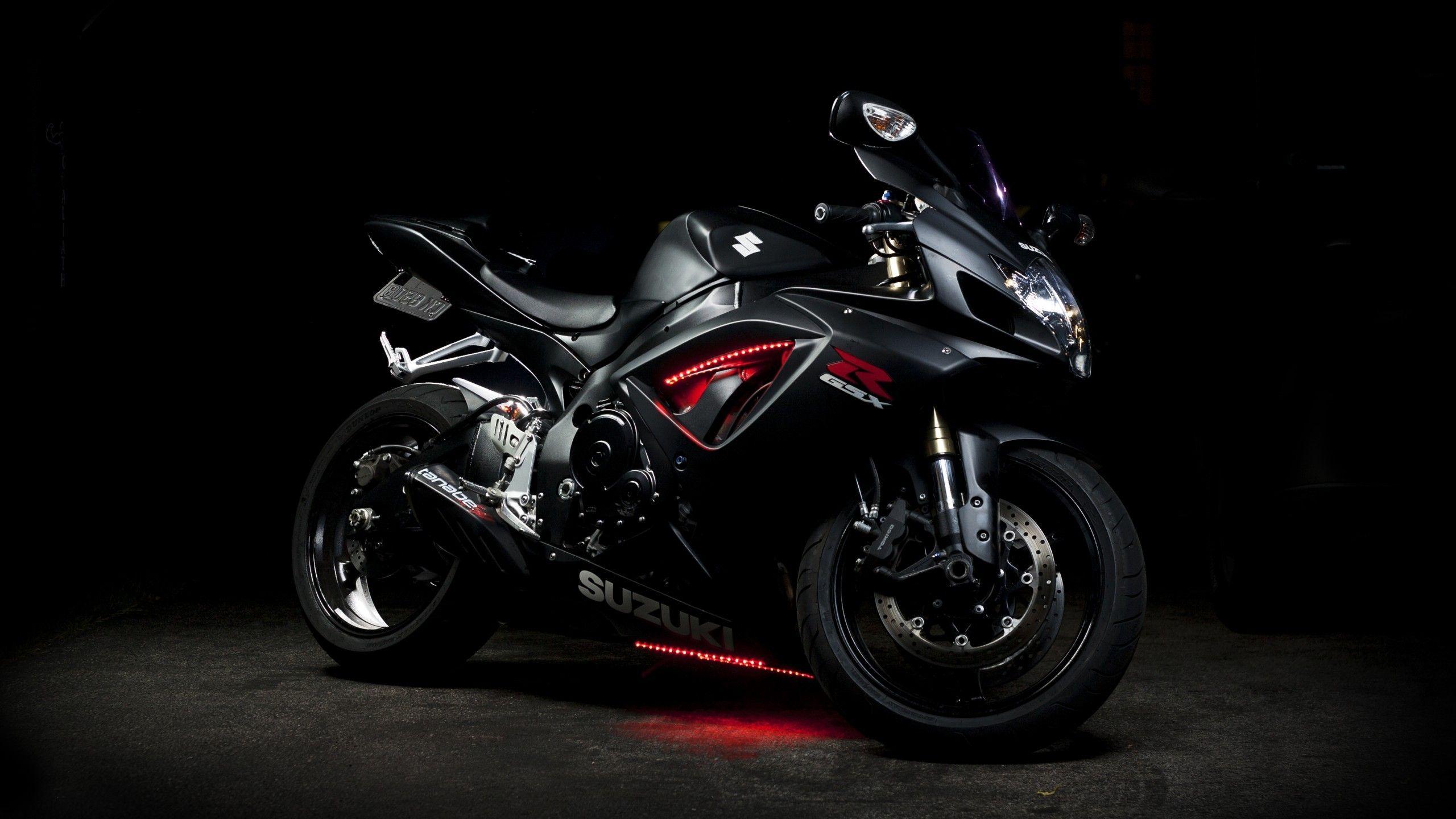 red and black sports bike