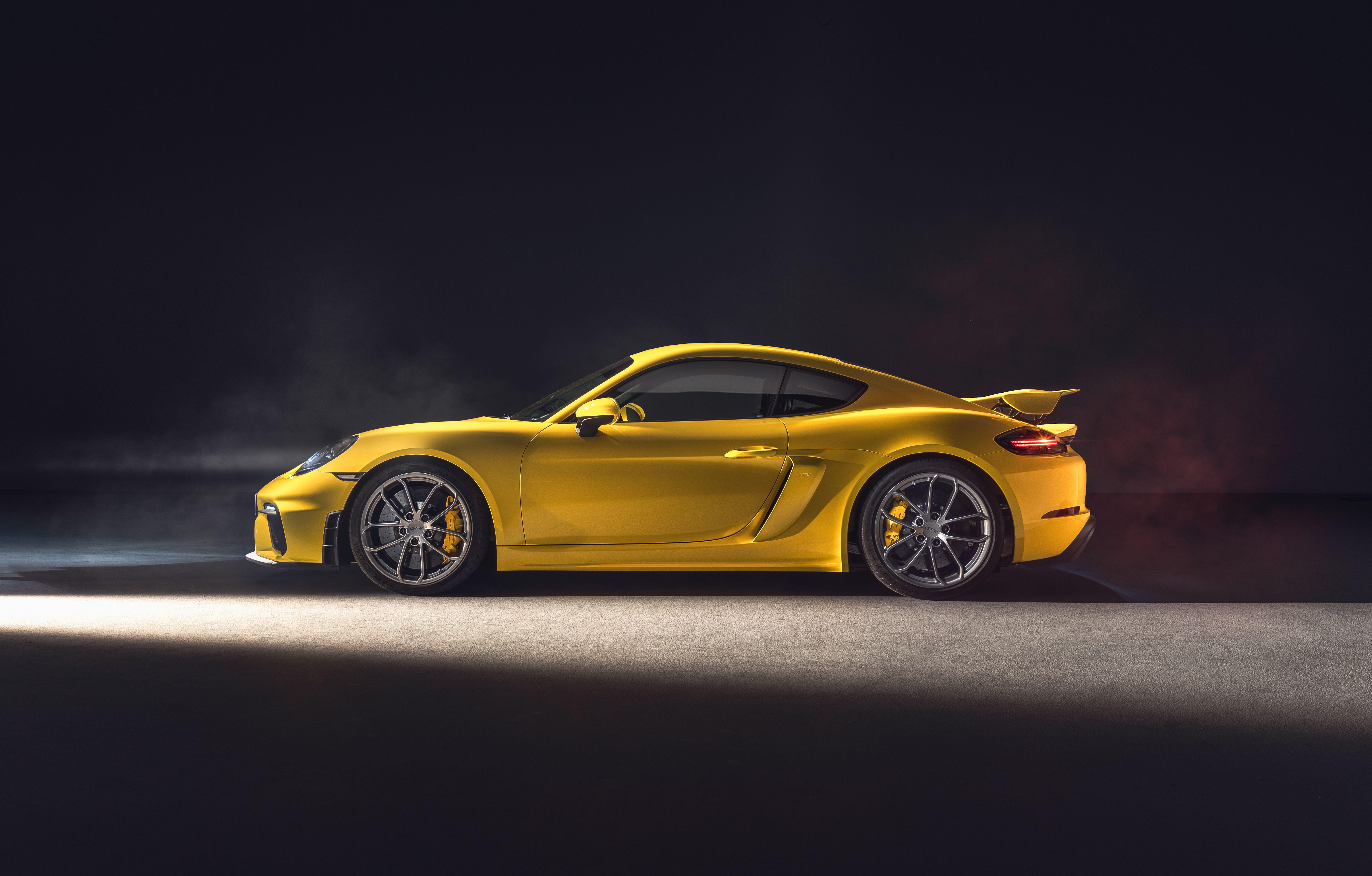 7522x4800 2019 Yellow Porsche 718 Cayman GT4 Sports Car Wallpaper