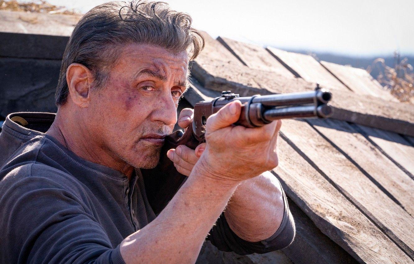 1332x850 Wallpaper look, pose, rifle, Sylvester Stallone, Sylvester