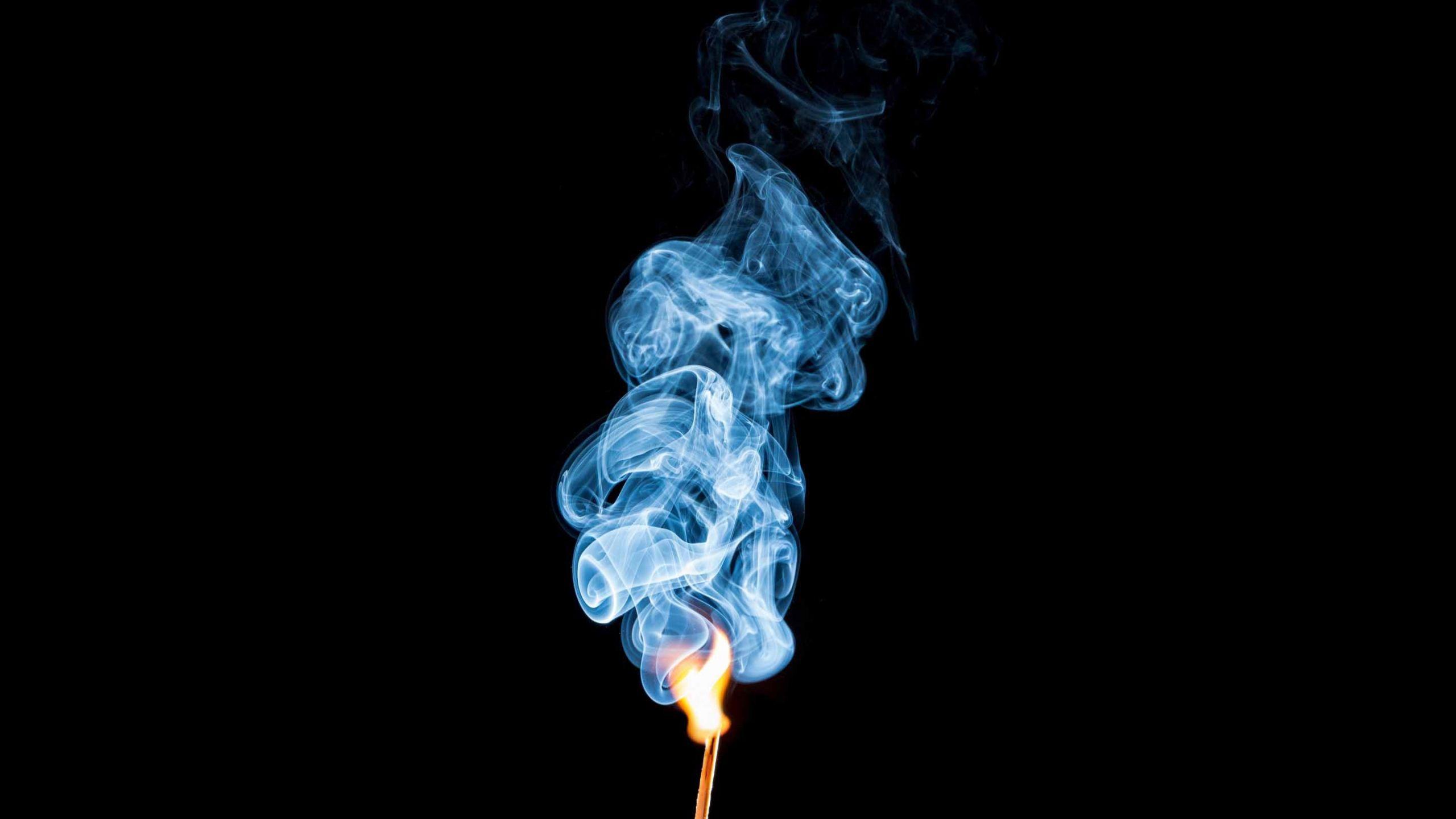 2560x1440 Burning Mamachstick With Smoke Mac Wallpaper Download