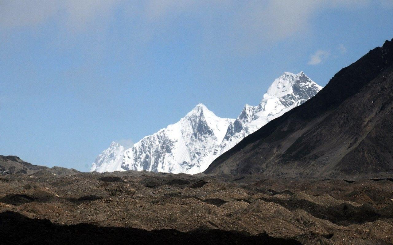 1280x800 Karakoram Tag wallpaper: Trango Towers Dawn Storm Baltoro Glacier