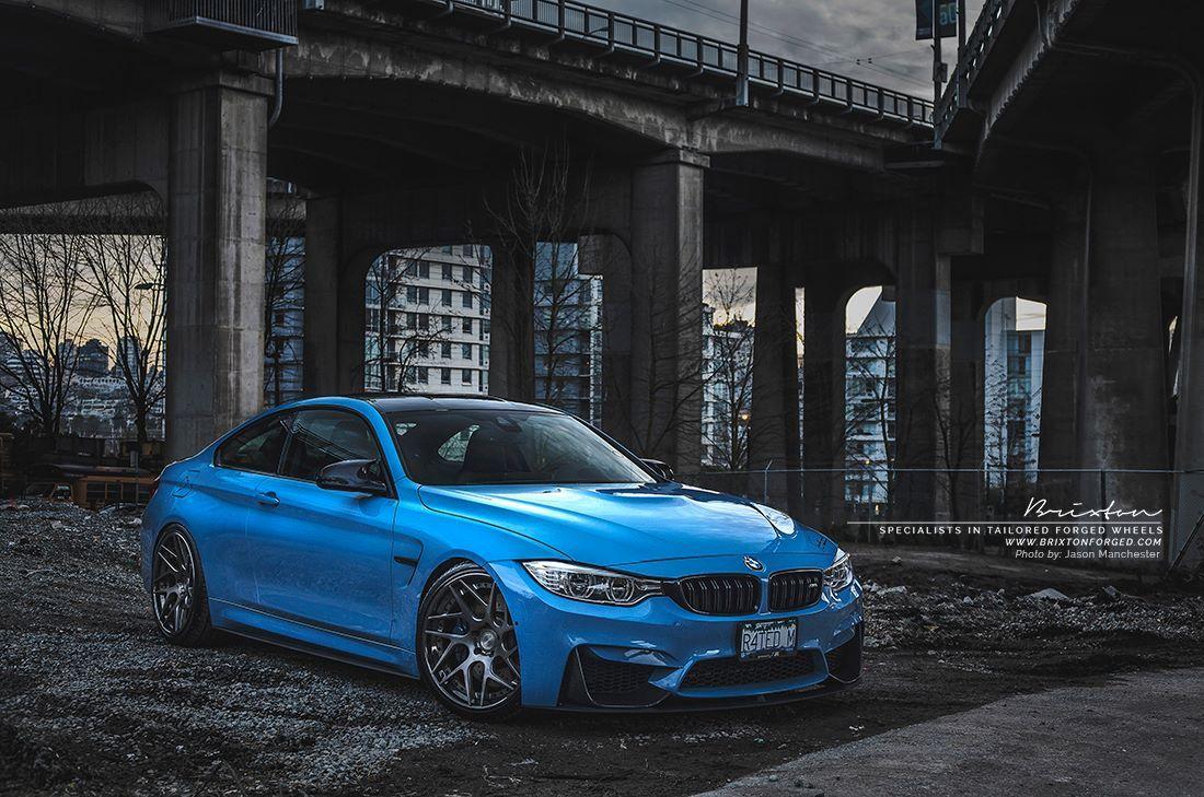 1100x729 Yas Marina Blue BMW M4 with Smoke Black Brixton Wheels