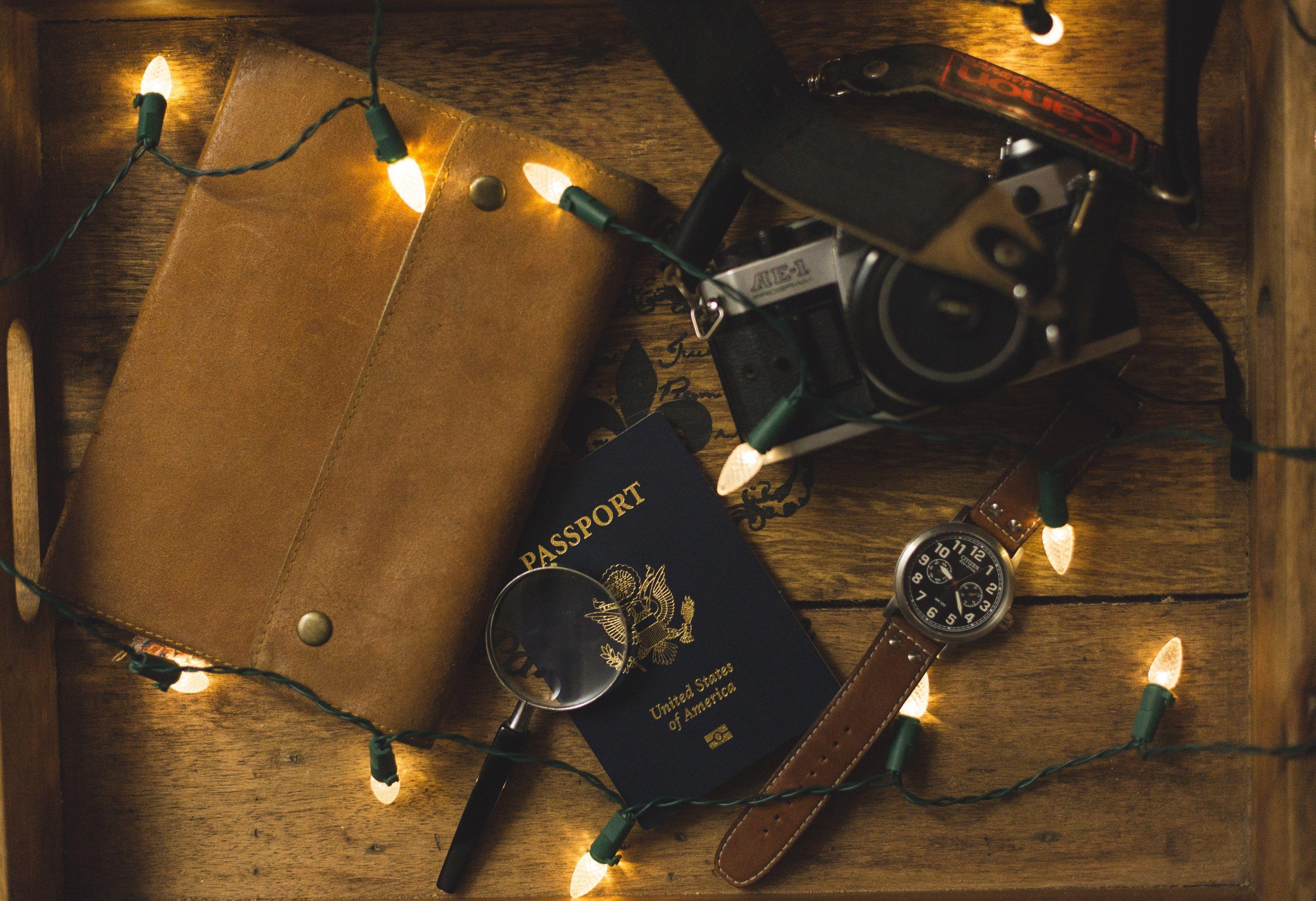 3840x2630 Wallpaper / flatlay passport watch and magnifying glass